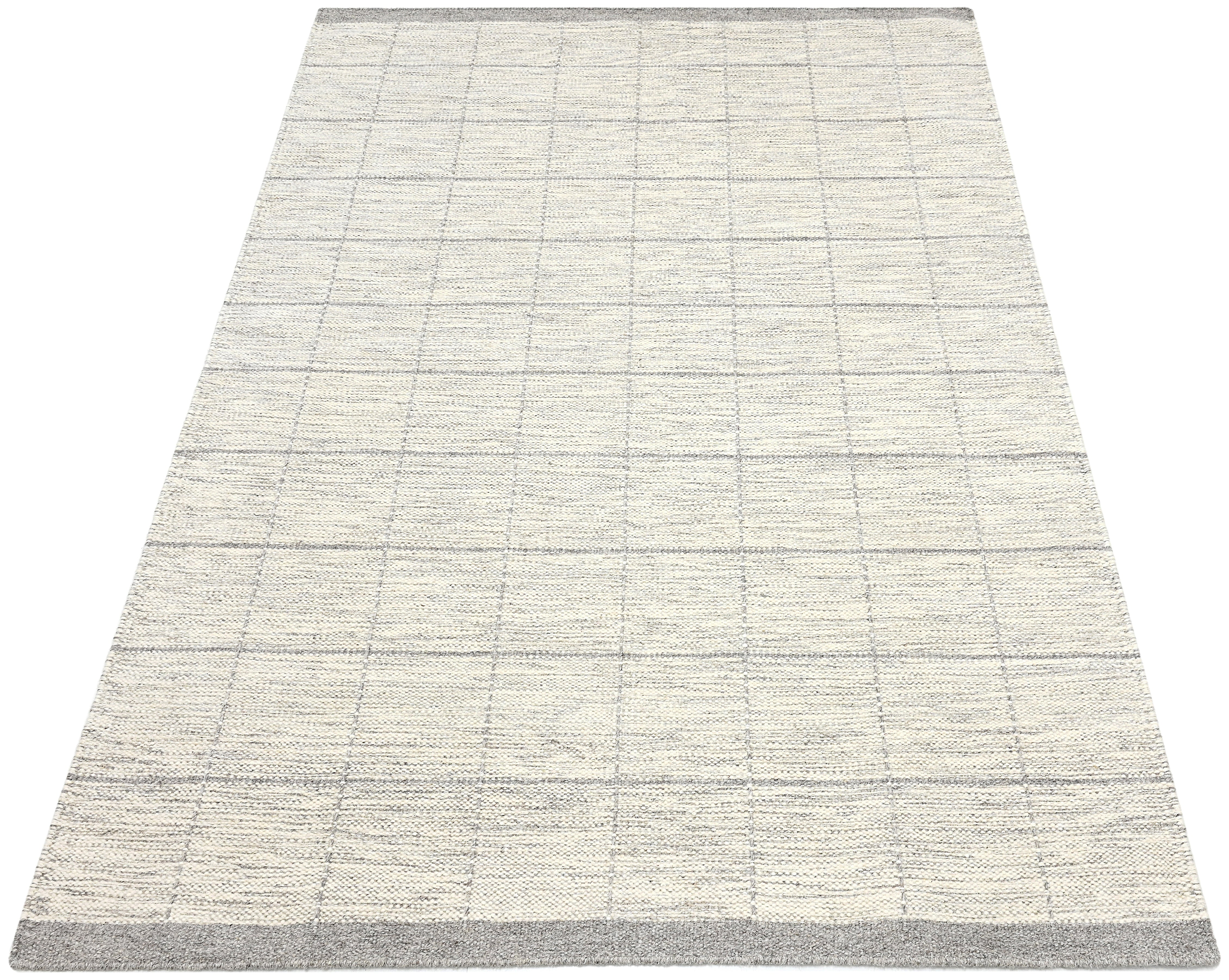 Beige neutral area rug with checkered design