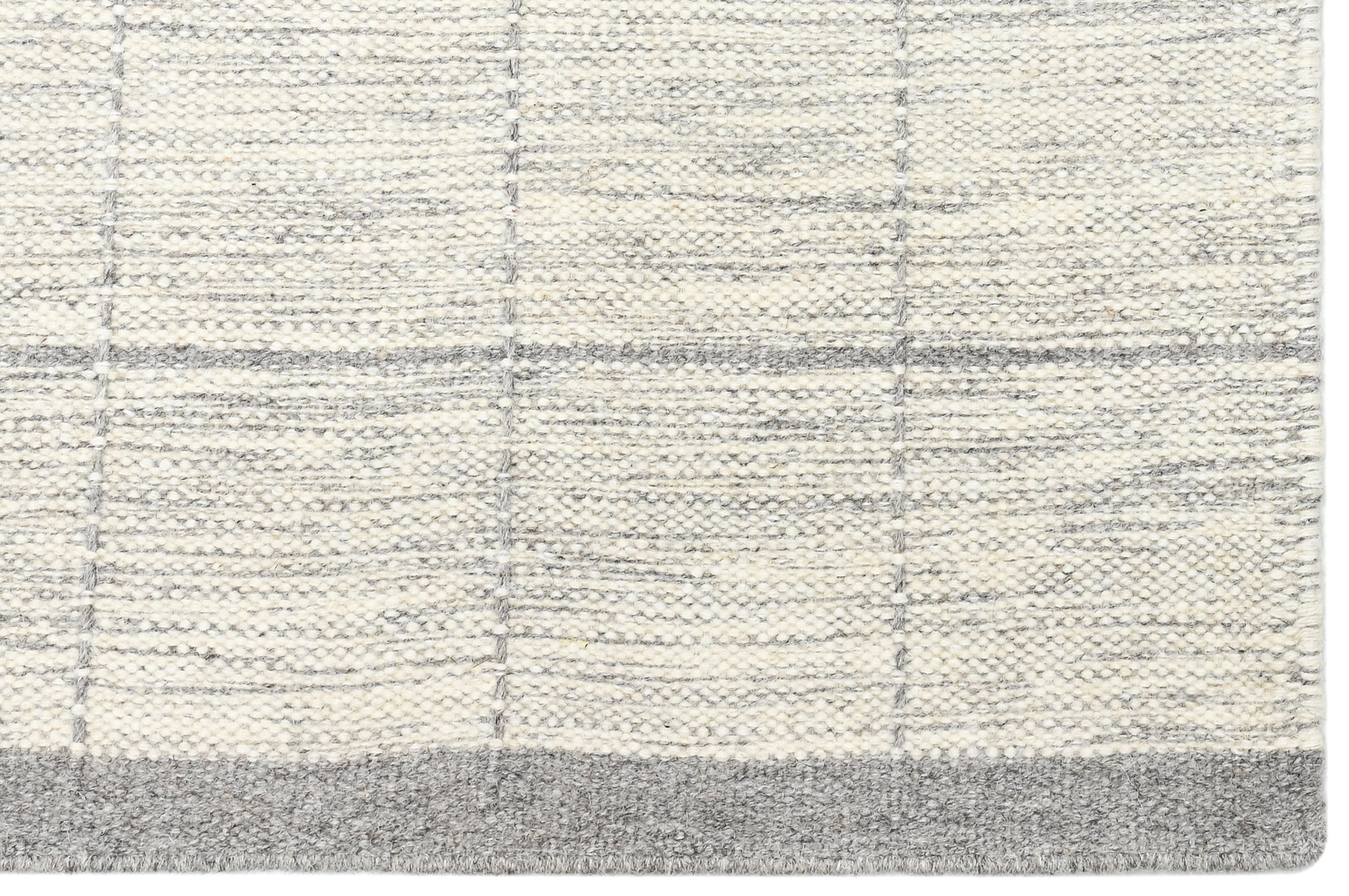Beige neutral area rug with checkered design