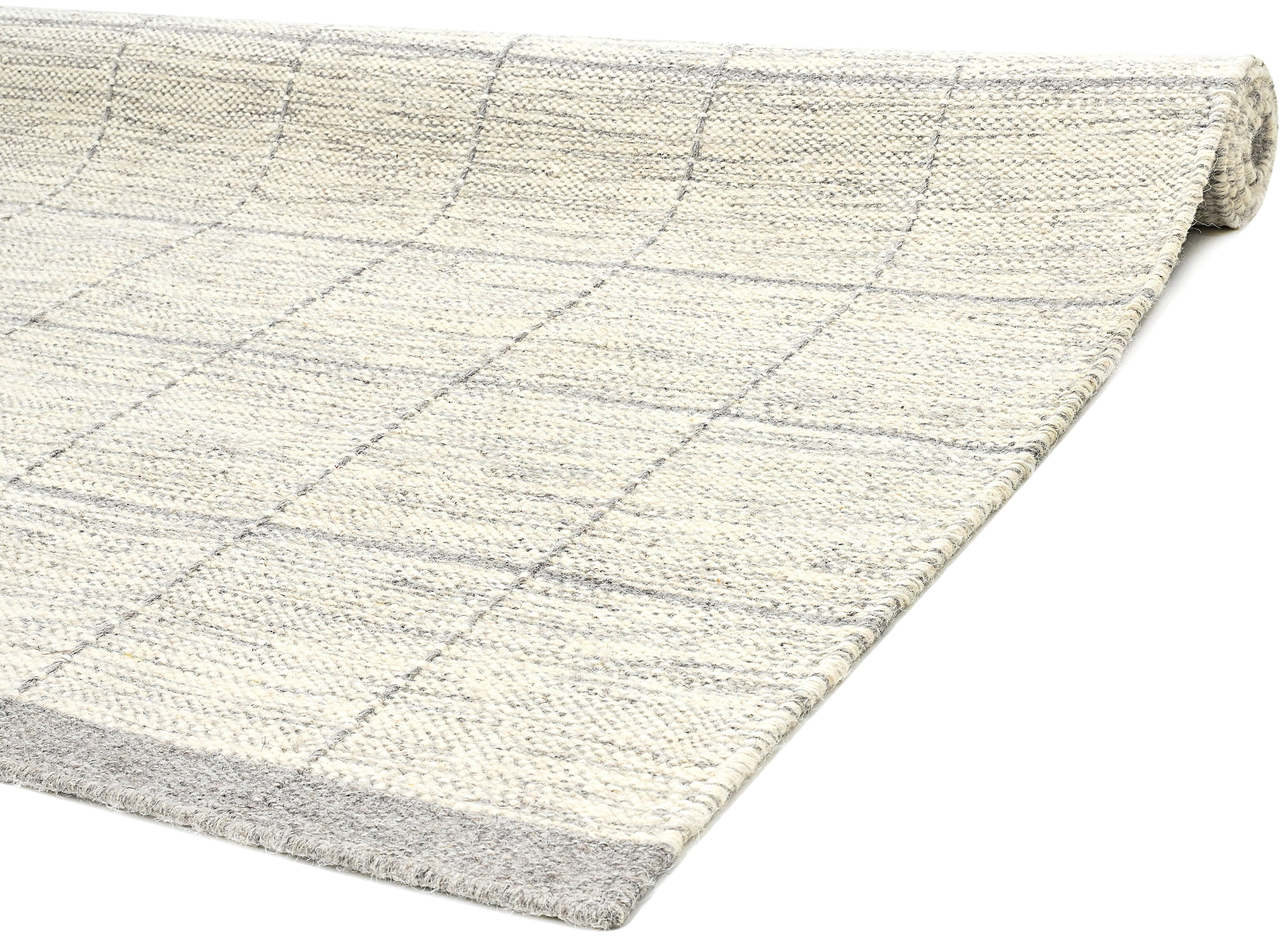 Beige neutral area rug with checkered design
