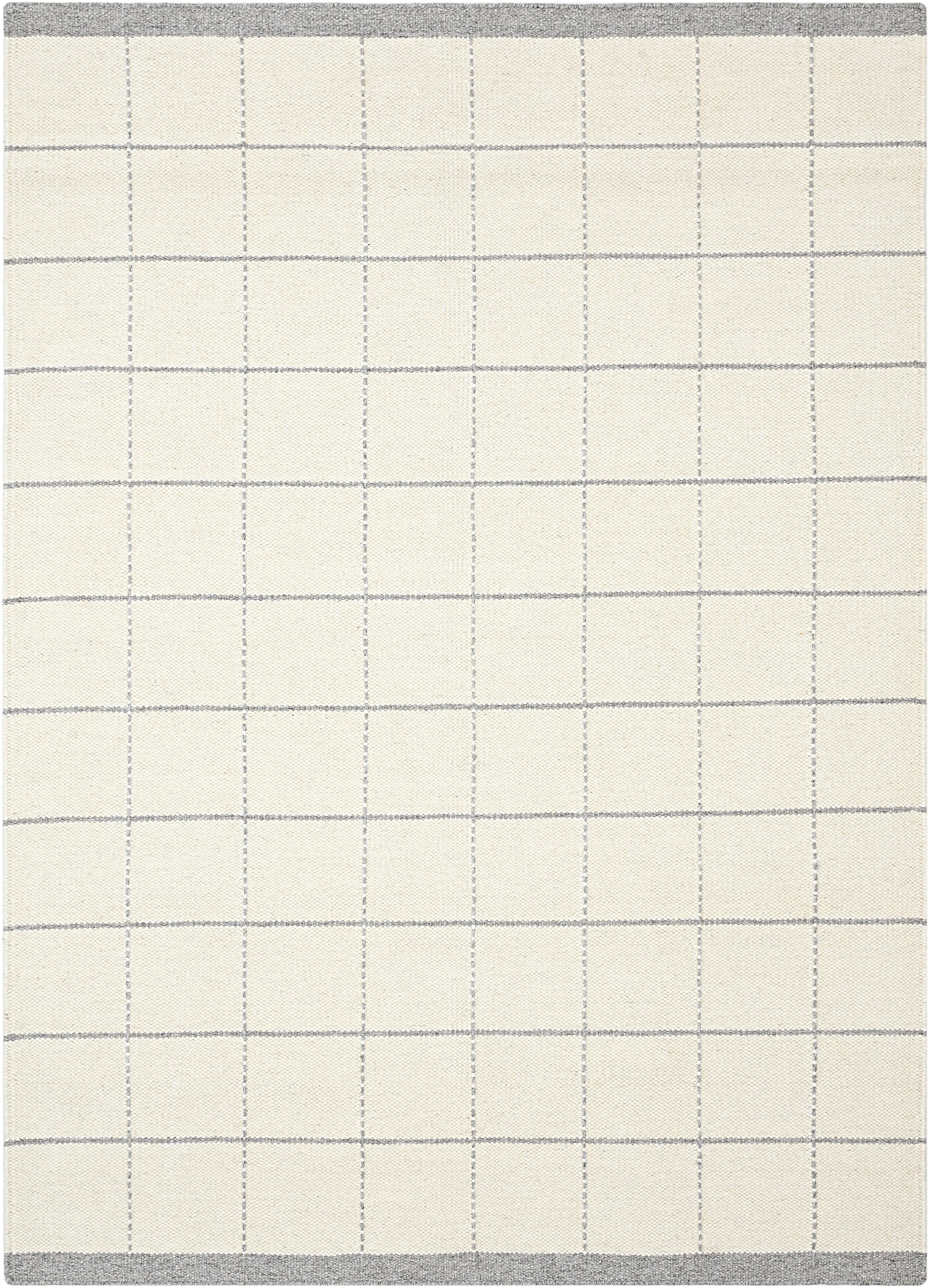 White wool and cotton area rug with grey checkered design