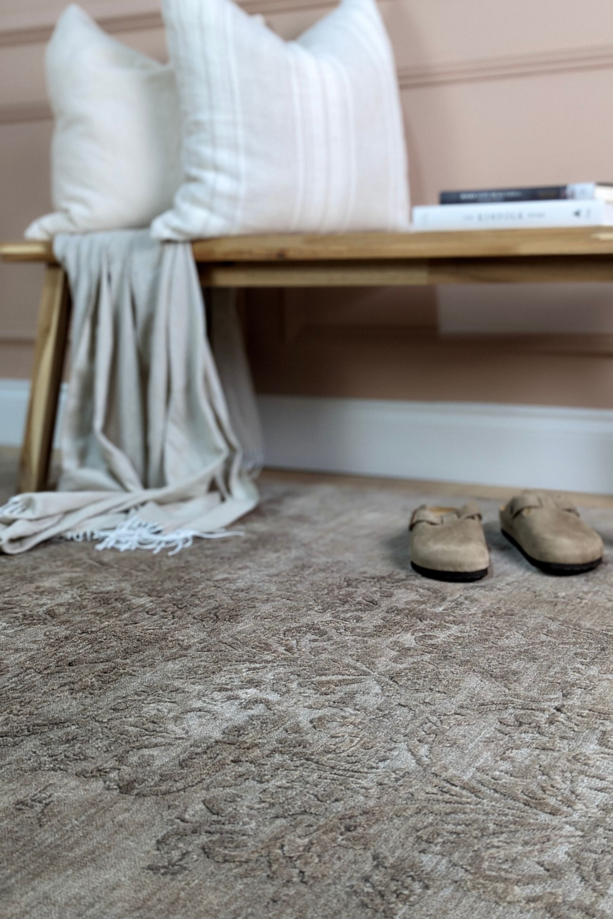 Authentic oriental rug with a damask pattern in beige