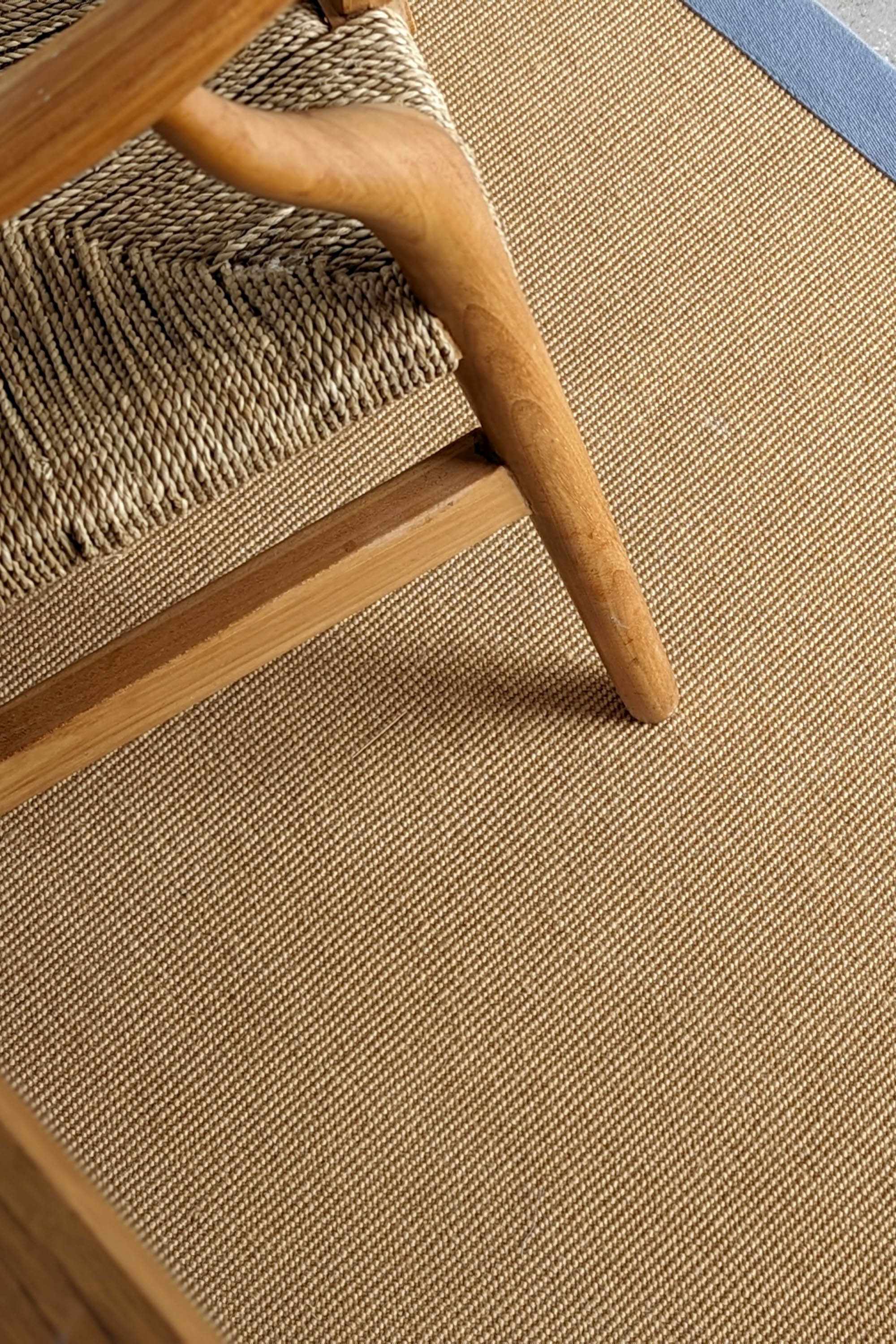 Sisal rug with blue linen border