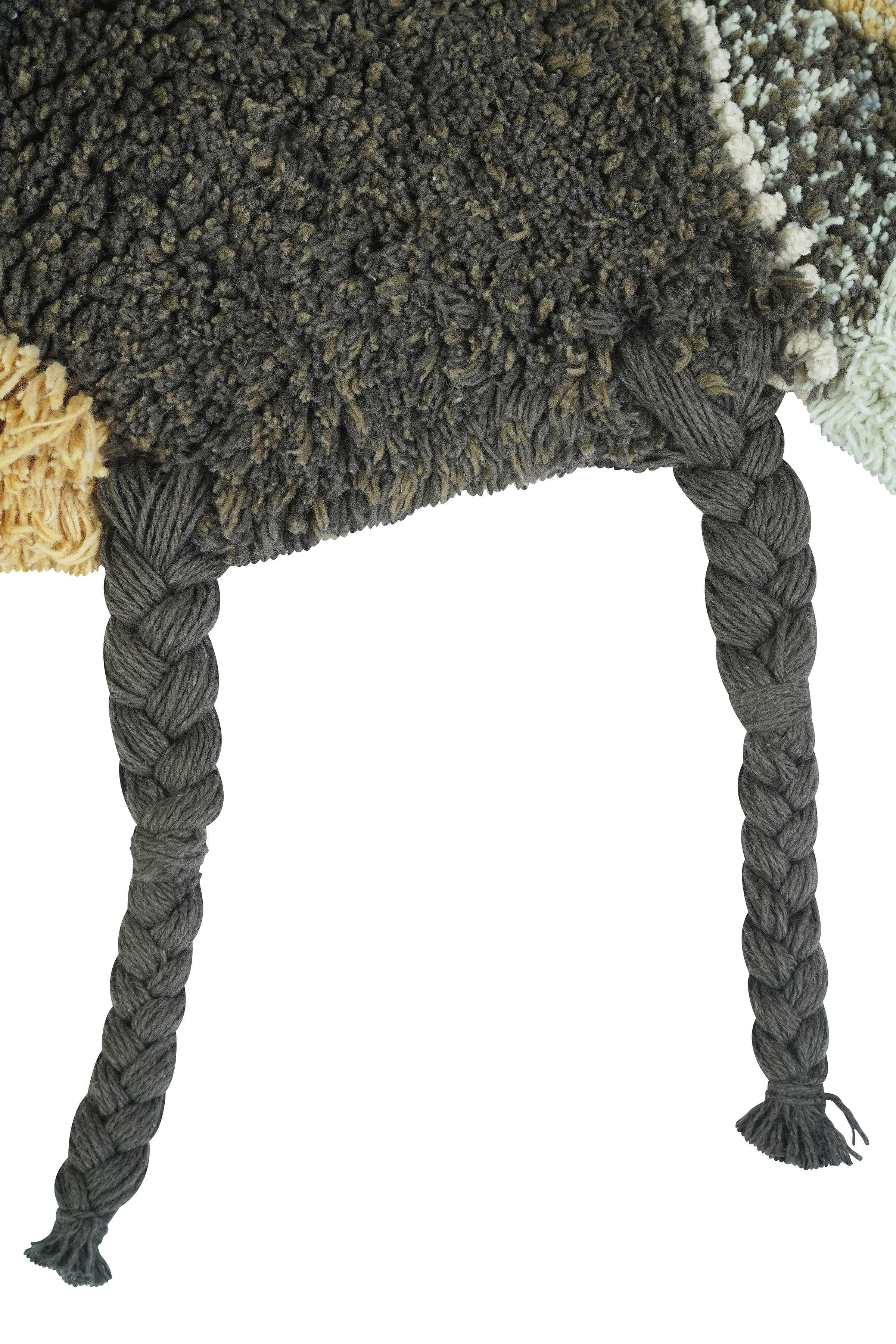 Bee-shaped rug with shades of gold, orange, brown, cream, and beige