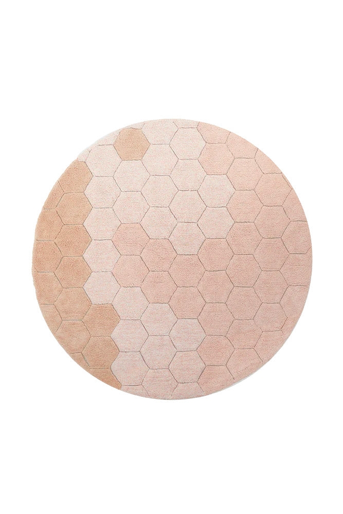 Round rose pink rug with honeycomb pattern
