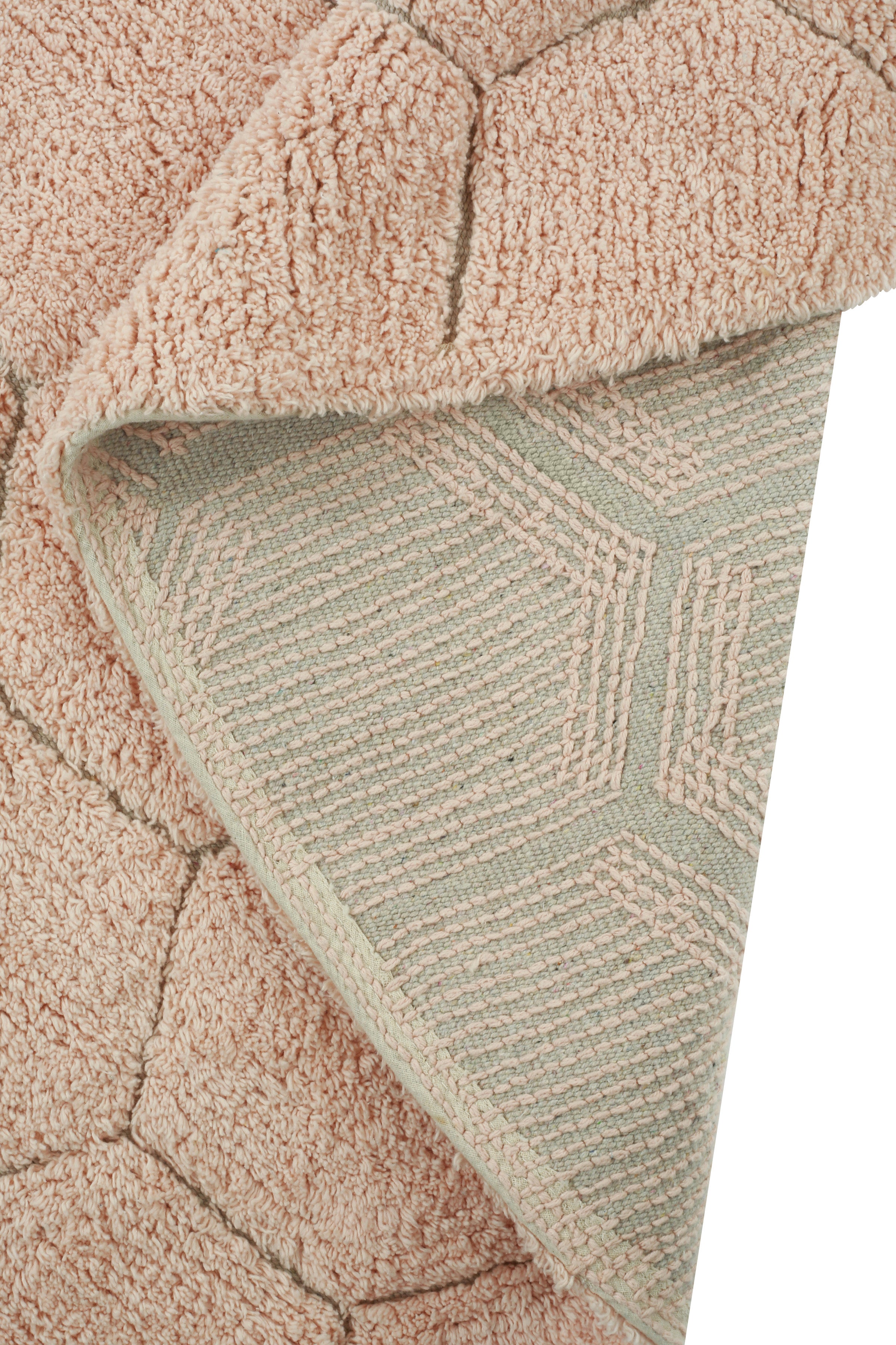 Round rose pink rug with honeycomb pattern