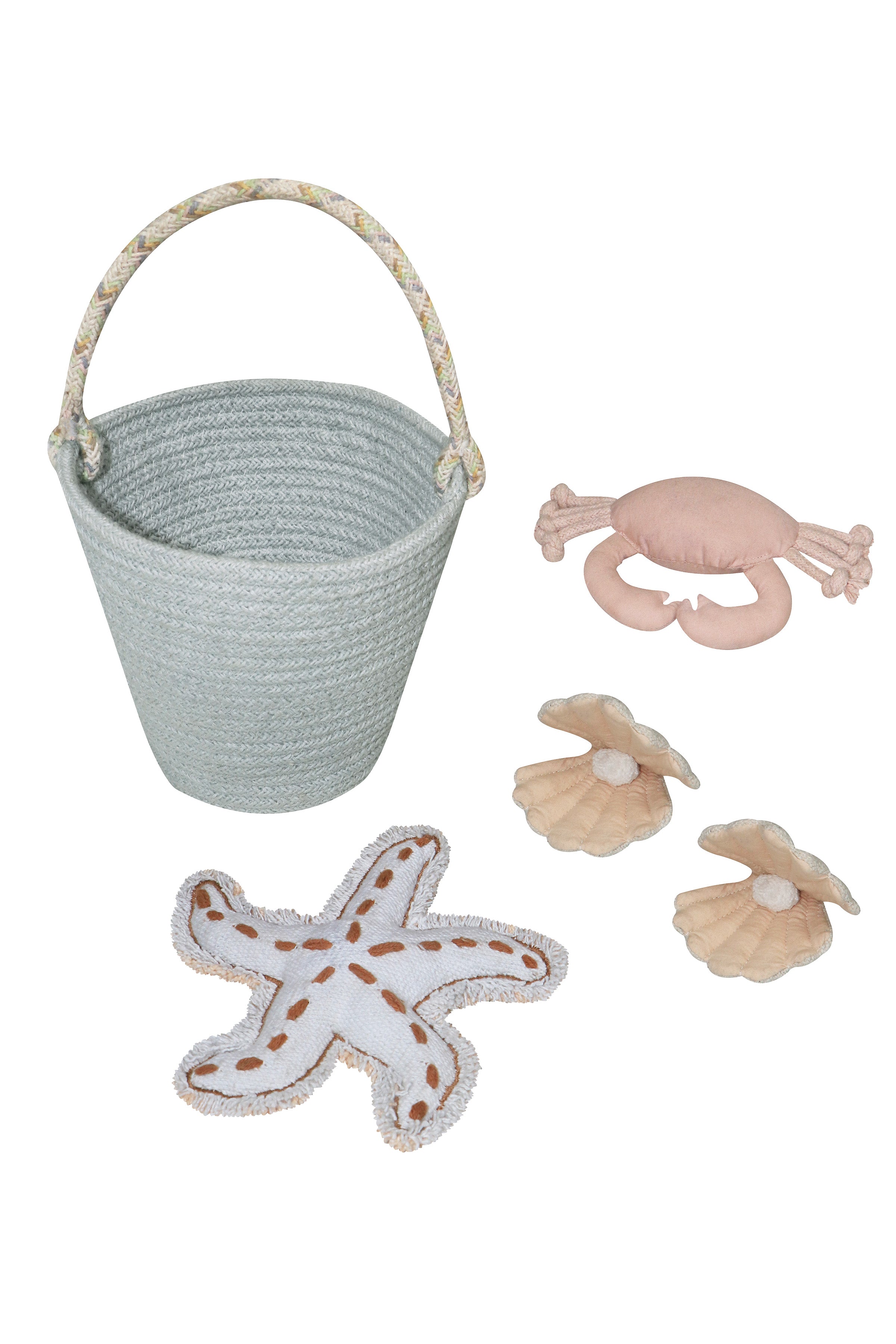 Beige island inspired rug with green fringing and added beach toys