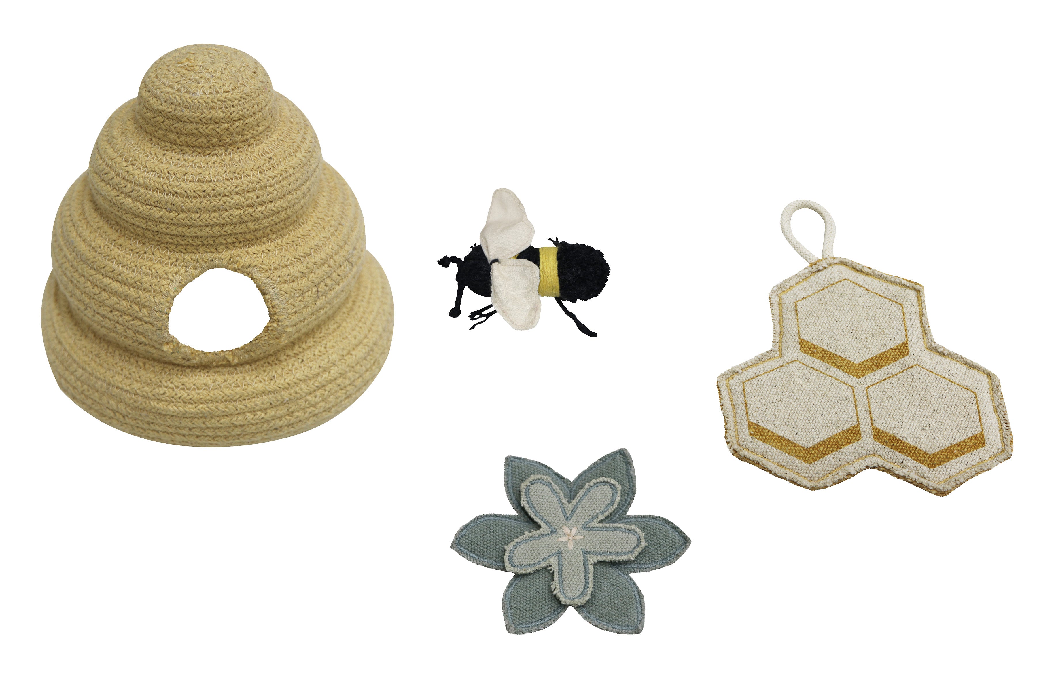 Cream rug with minimal yellow honeycomb pattern and honeybee toys