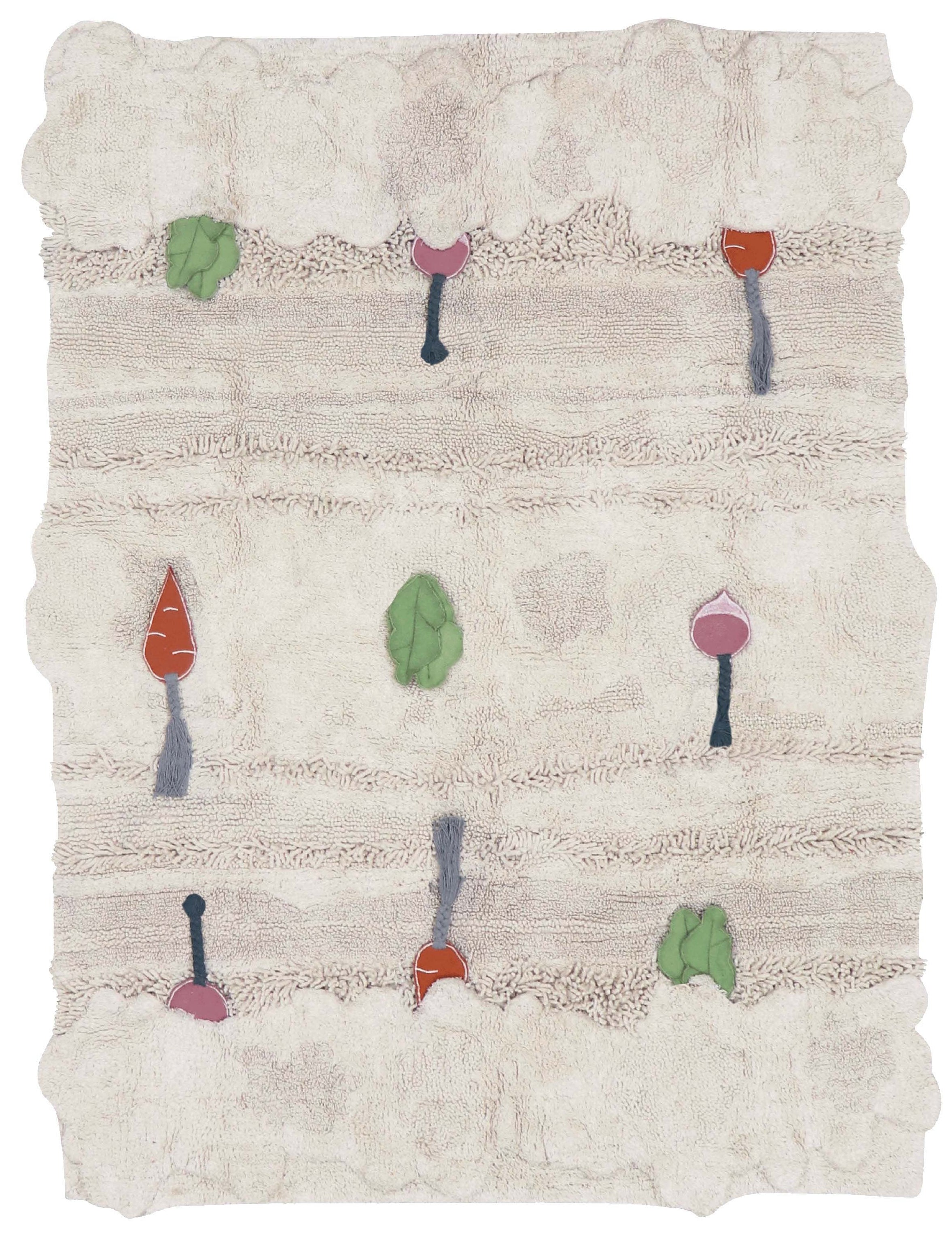 Green garden inspired rug with added vegetable toys
