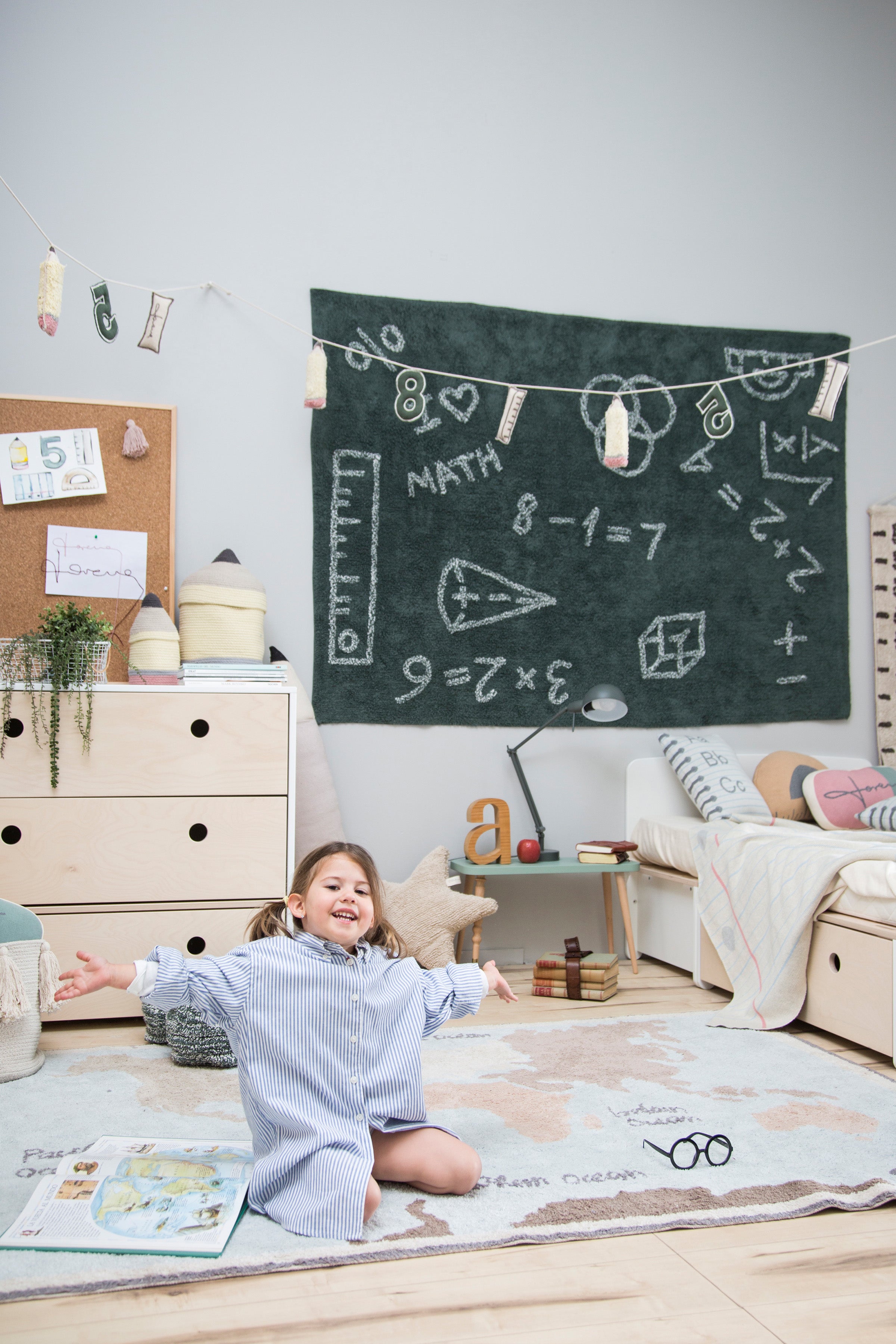 Blue children's rug with map of the world design