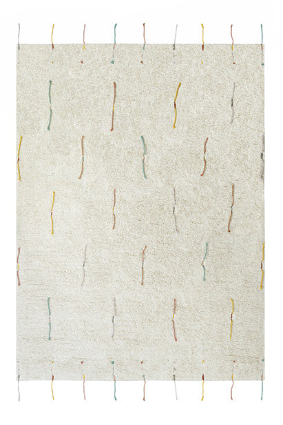 Plain cream rug with multicolour lined pattern and added wildflower toys