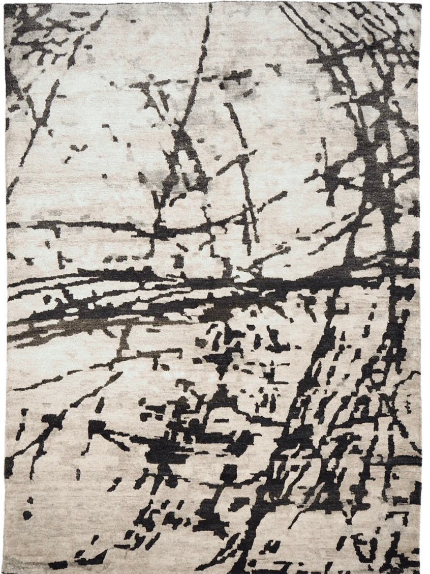 oriental rug with an abstract traditional pattern in grey