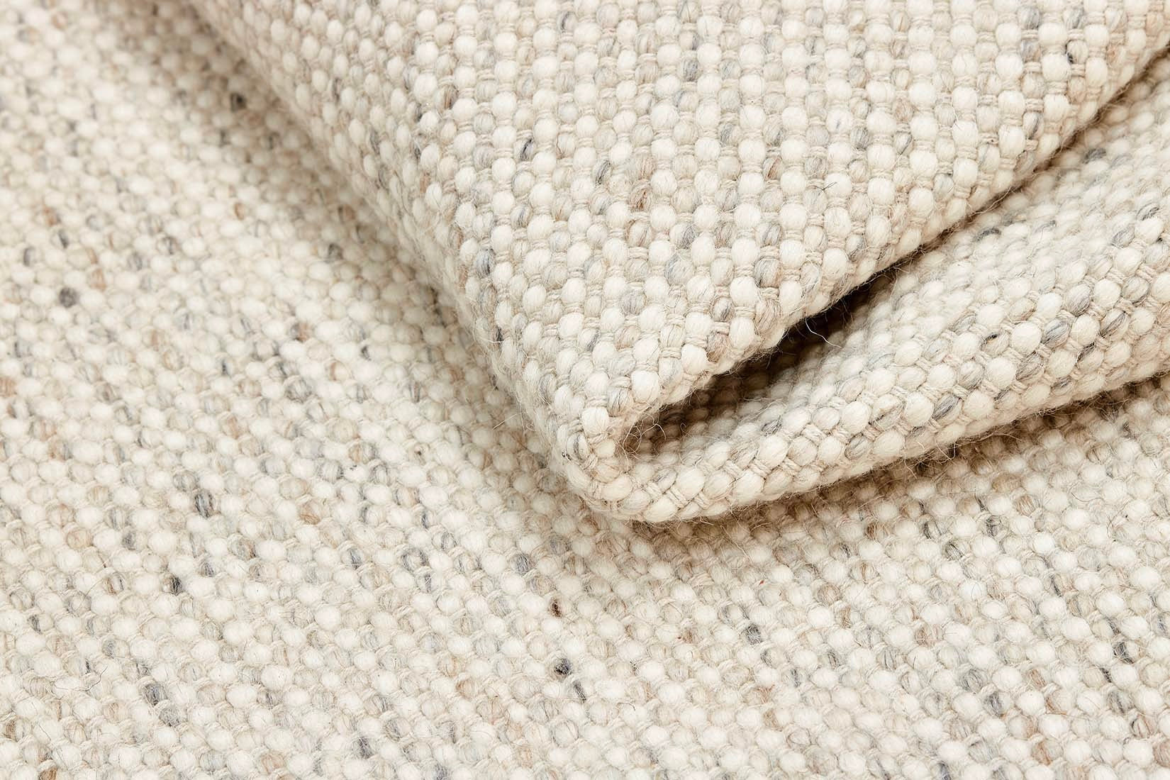 Grey textured area rug