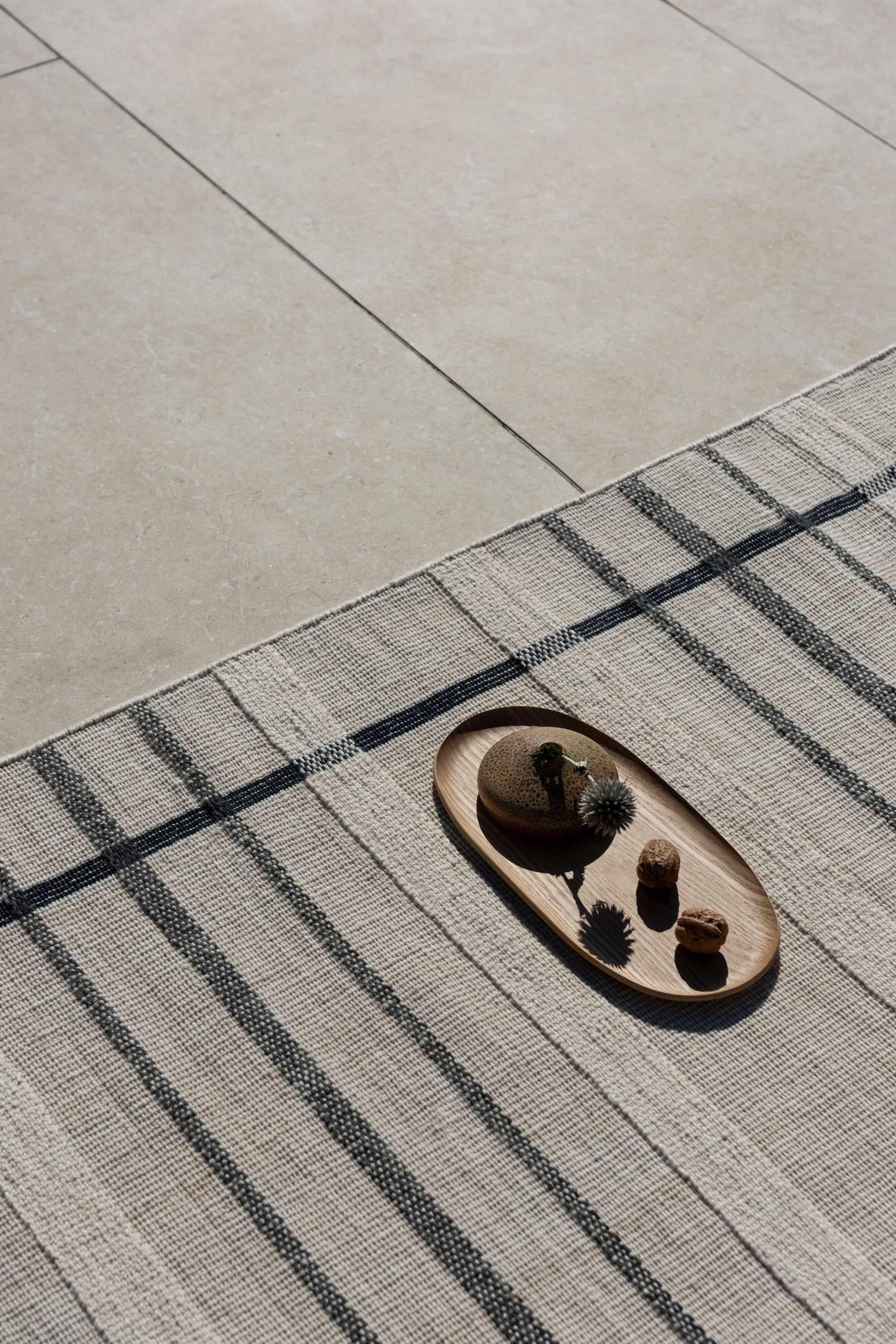 Modern beige geometric rug black pattern