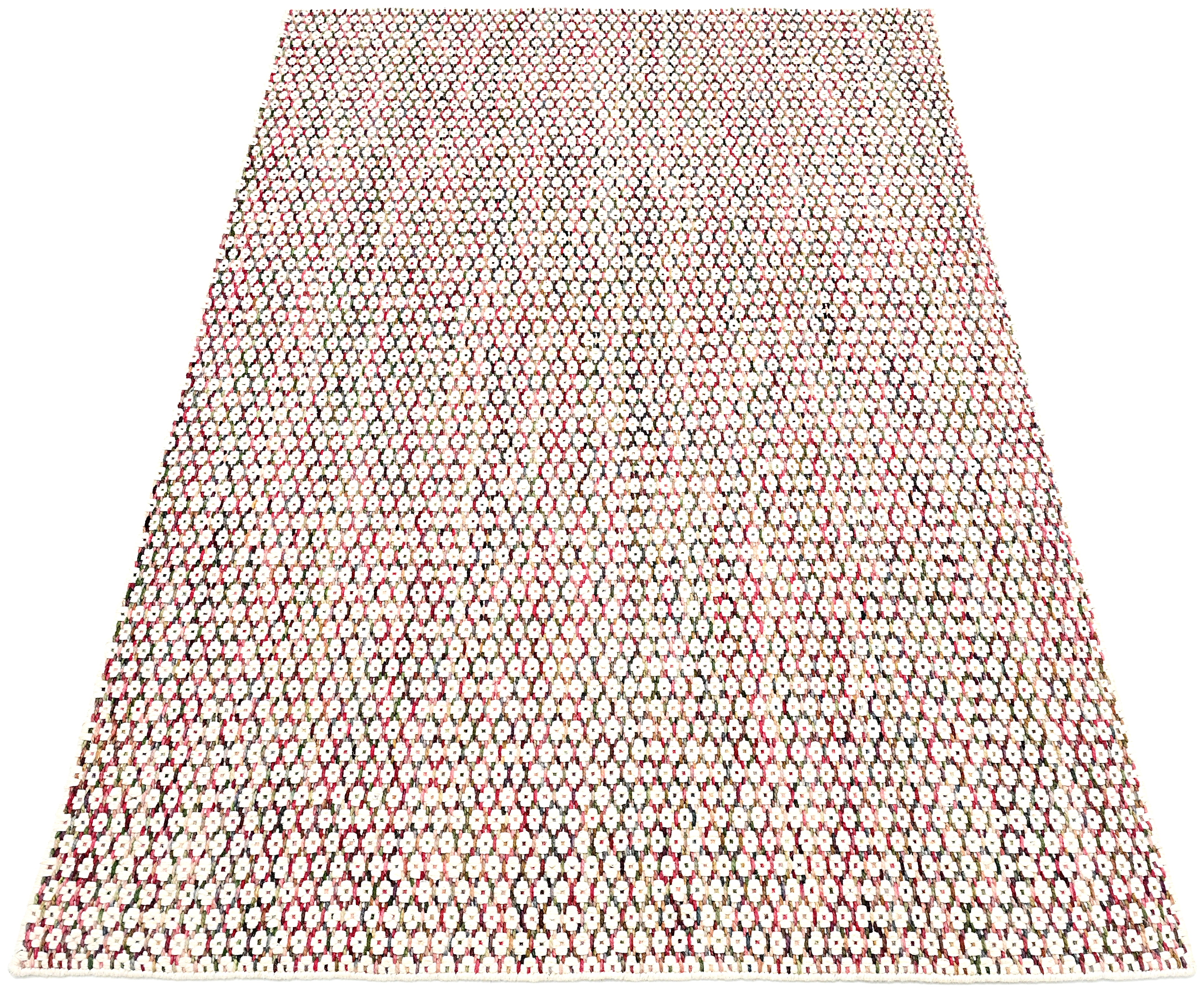 Textured wool rug with pink, blue and green yarns throughout