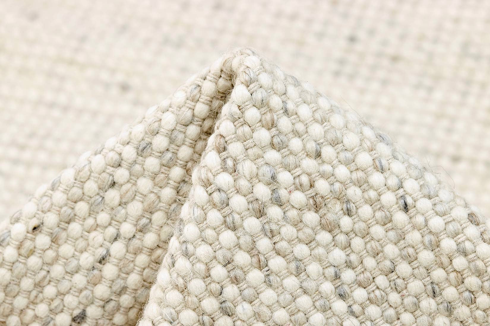 Grey textured area rug