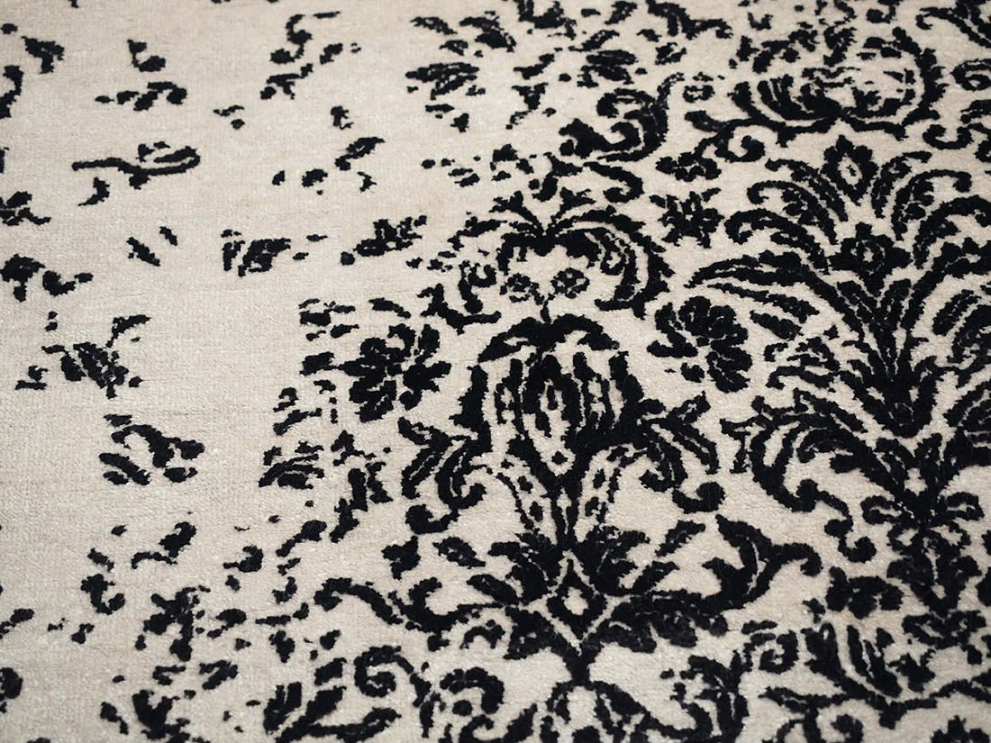 Authentic oriental rug with a damask pattern in brown