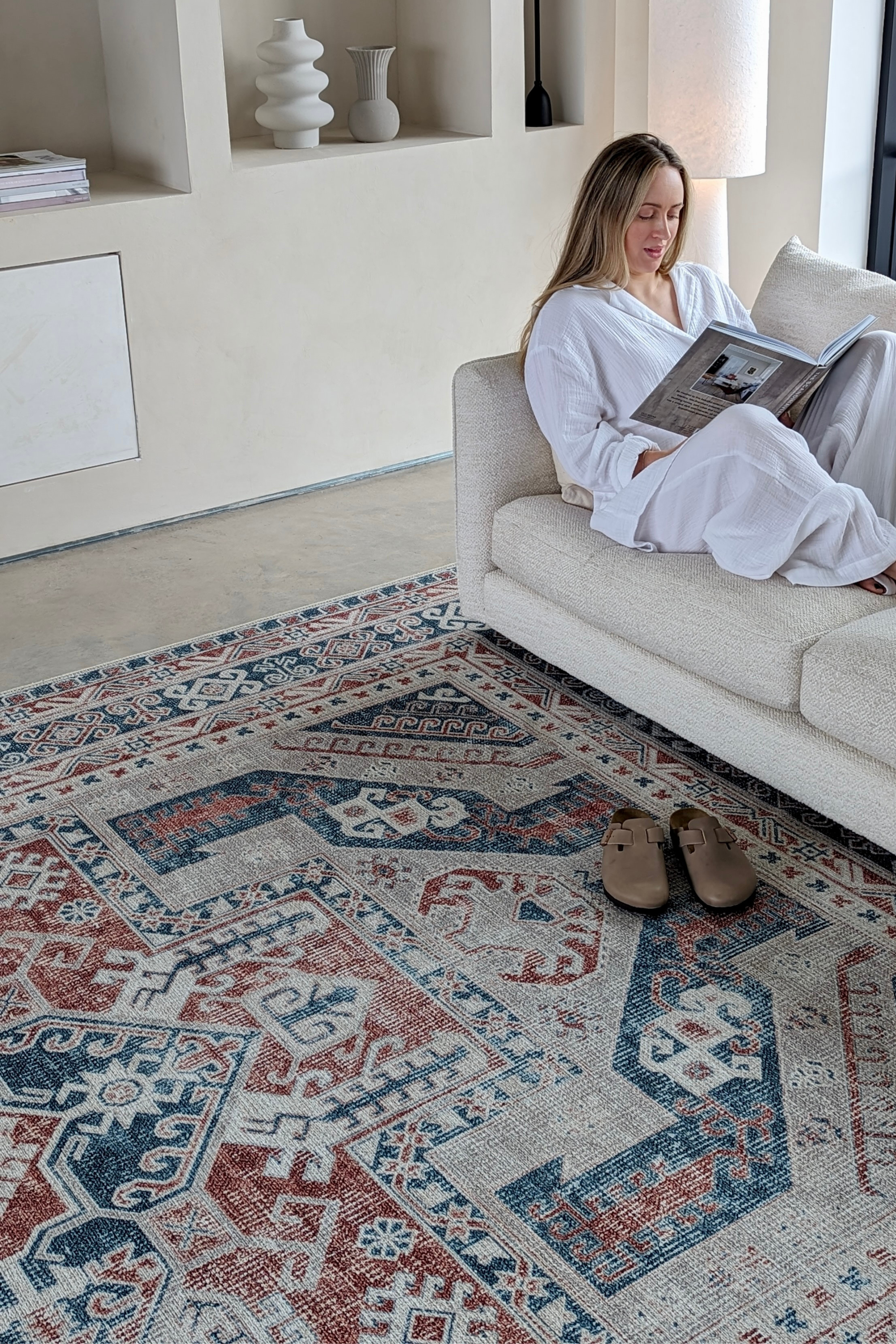 Blue and red bordered vintage style rug