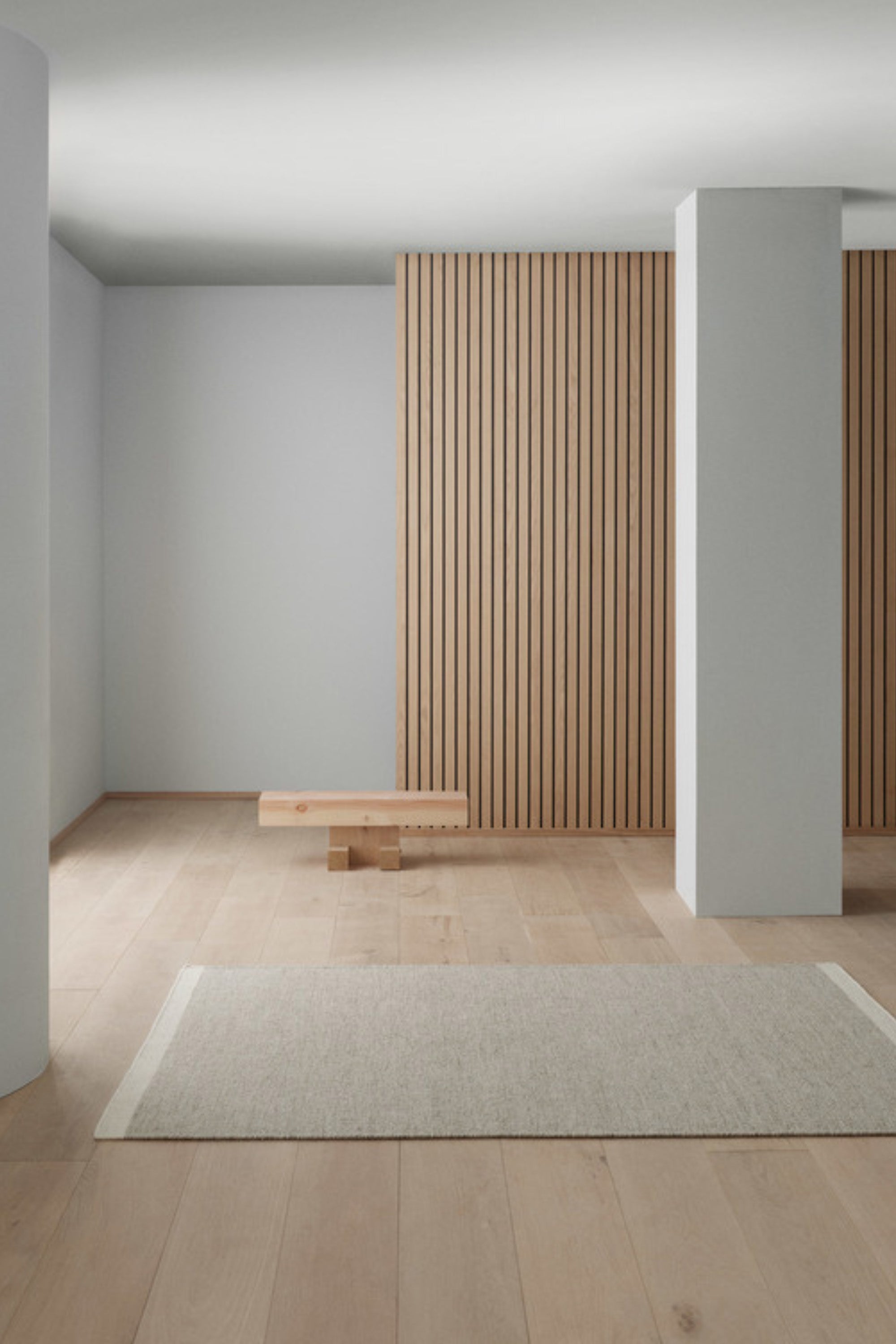 Woven beige wool rug