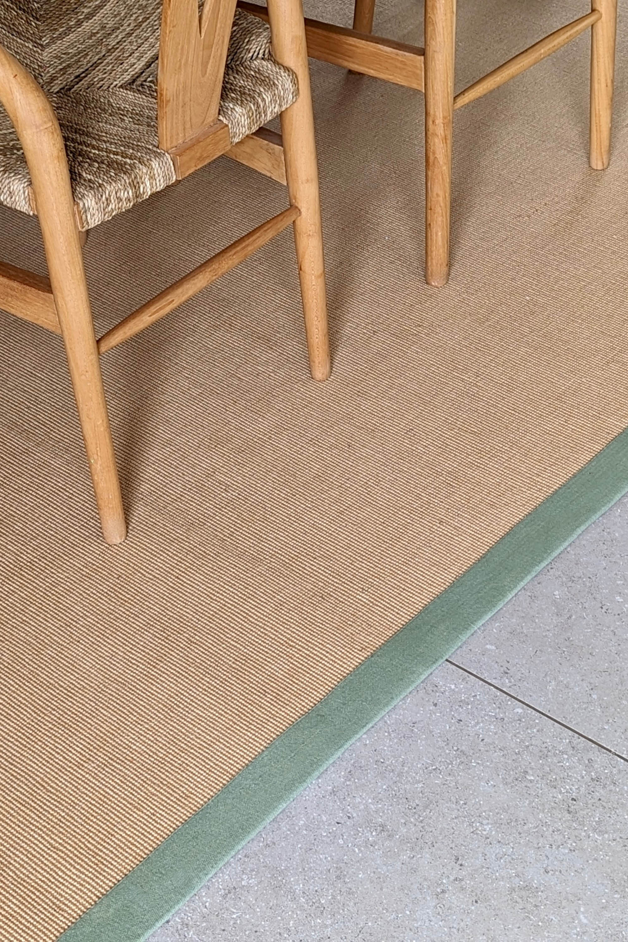 Sisal rug with green linen border