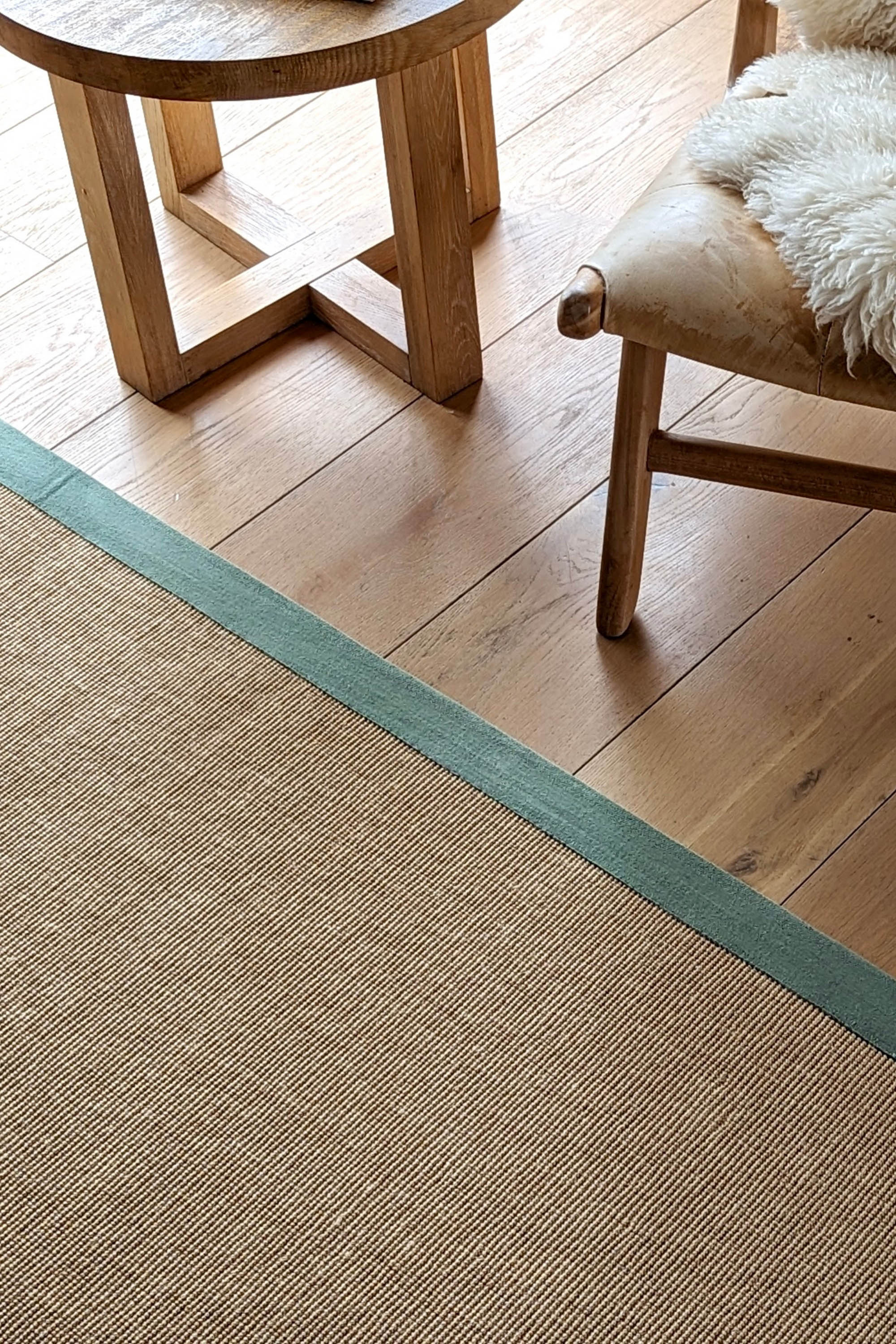 Sisal rug with green linen border