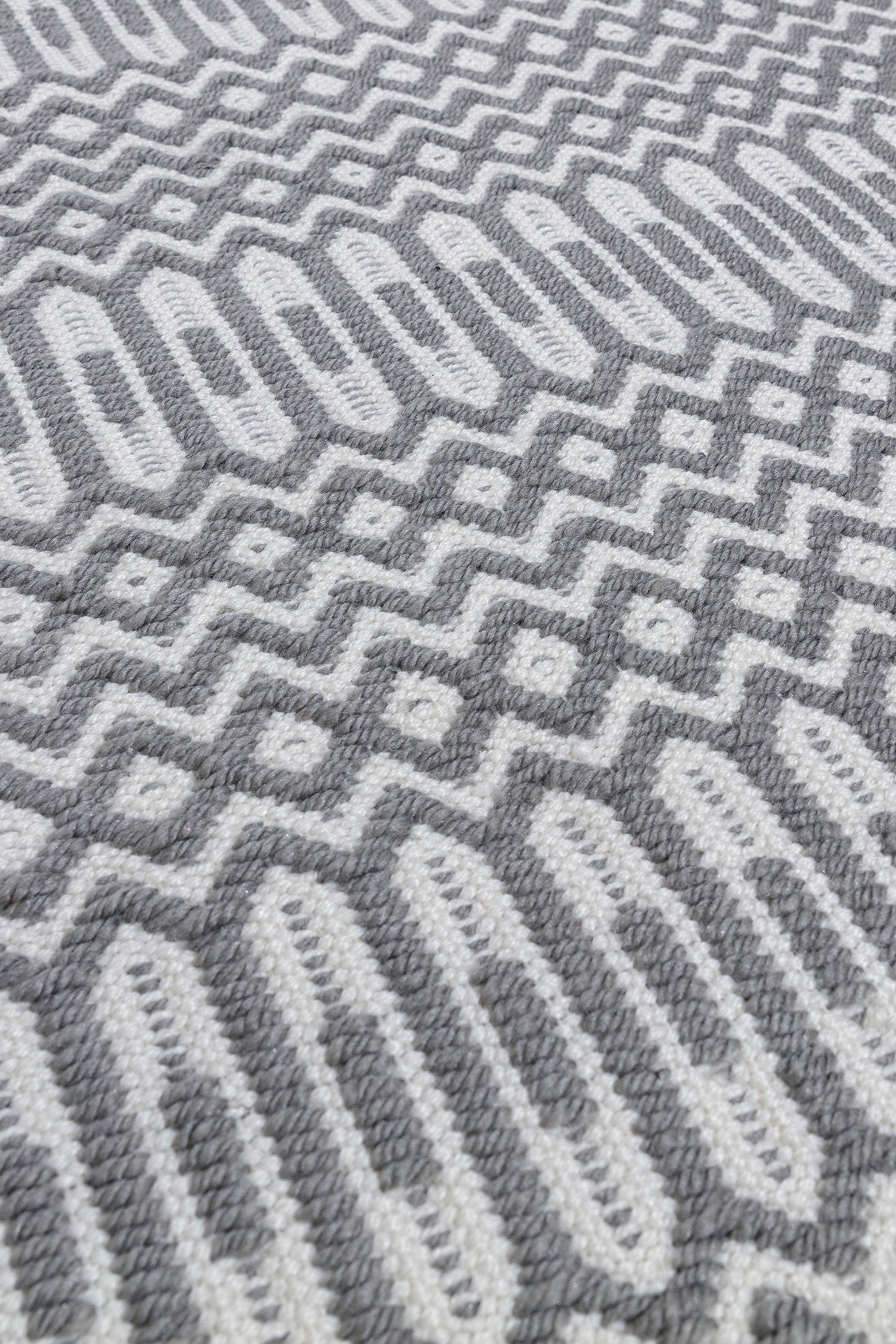 grey indoor/outdoor runner with geometric design