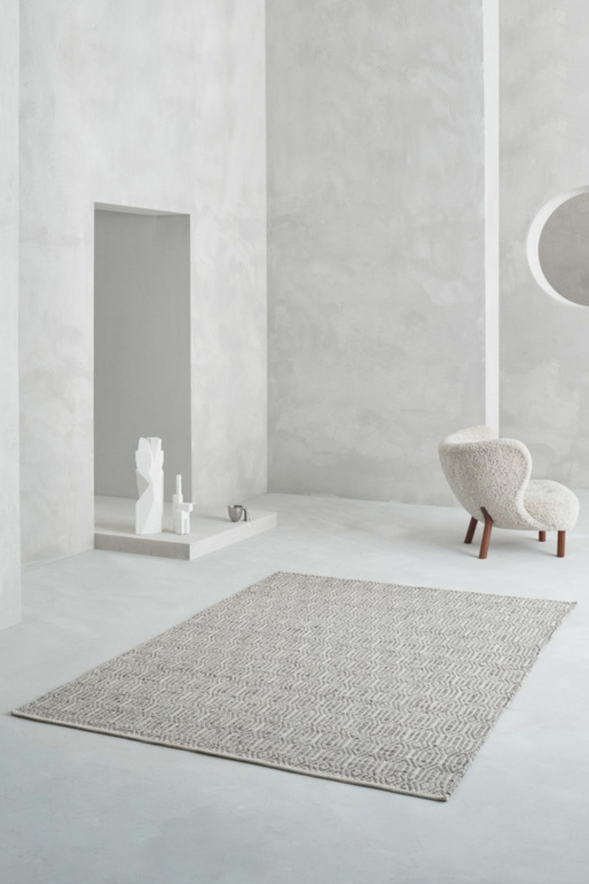 Woven grey wool/cotton/viscose rug