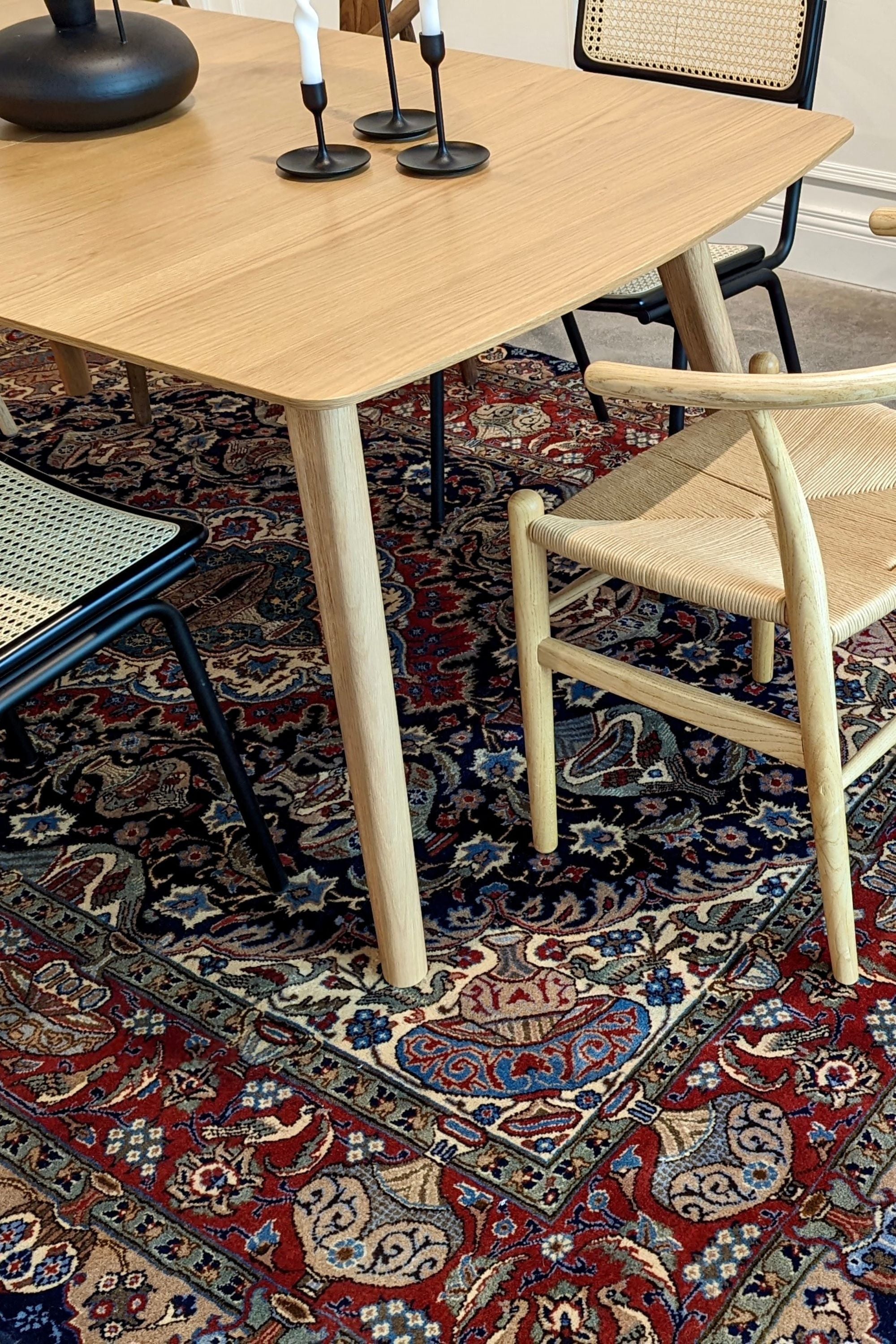 Authentic persian rug with a traditional floral design in red