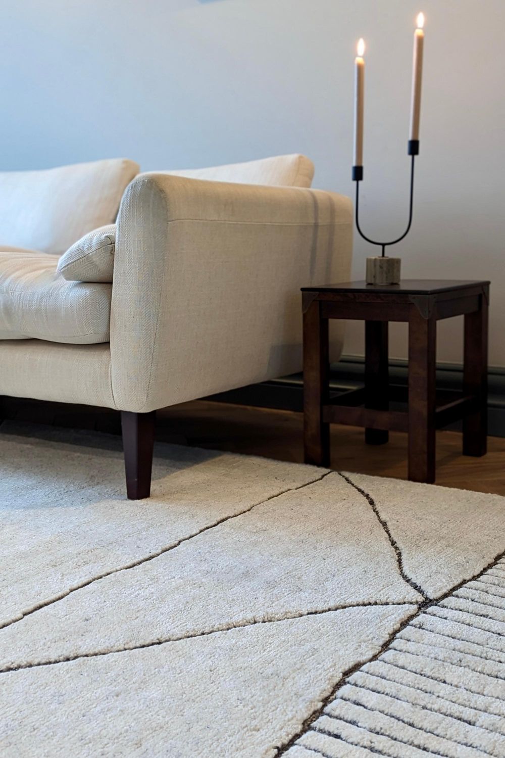 Cream area rug with abstract design