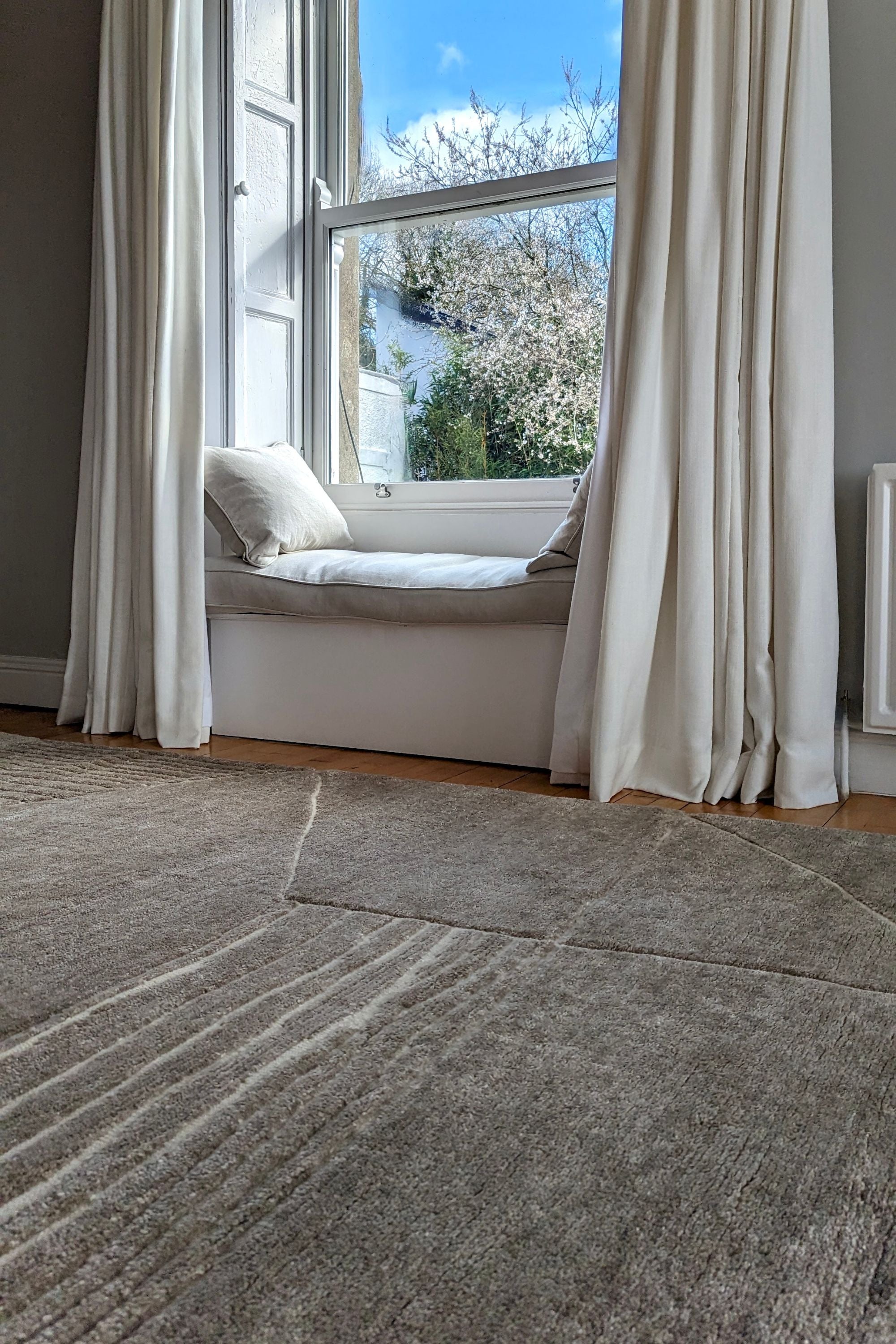 Minimal beige luxury Moroccan style rug