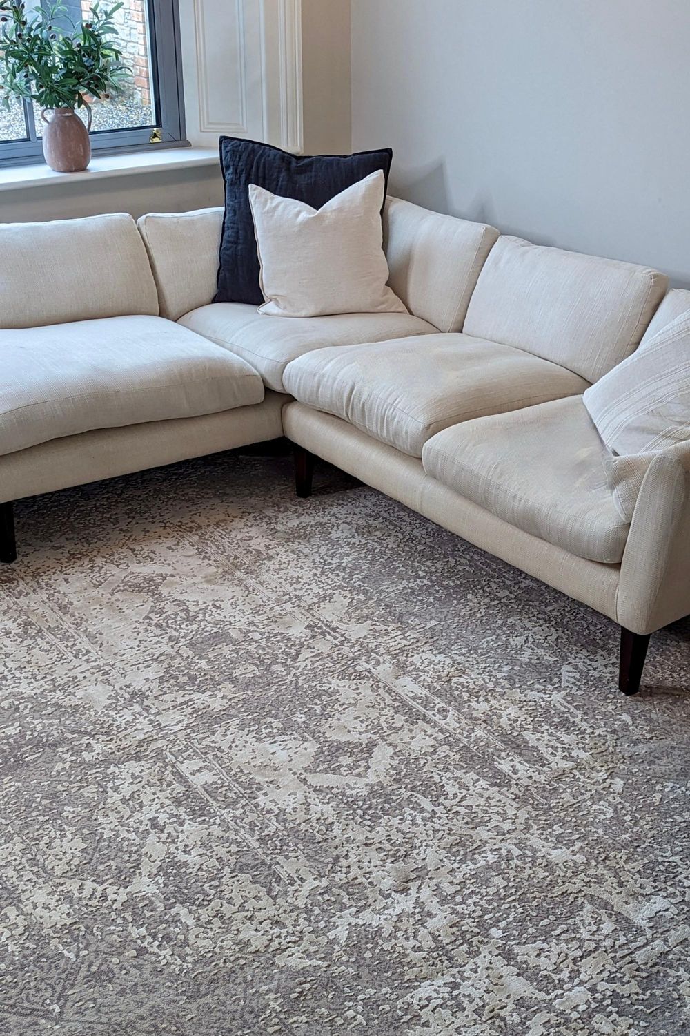 beige abstract area rug