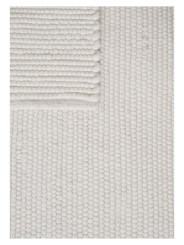 White textured woven rug