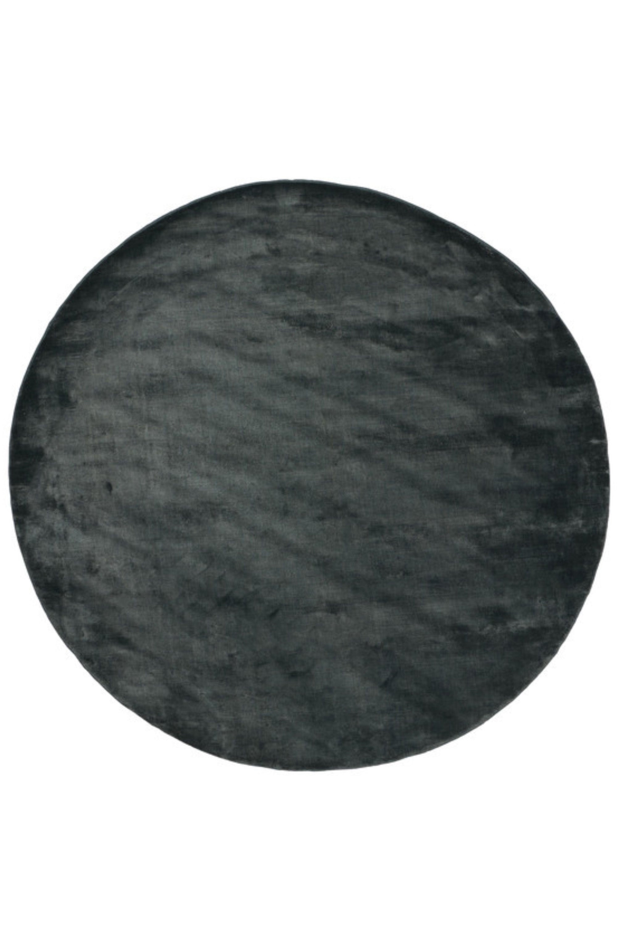 Plain round green viscose rug
