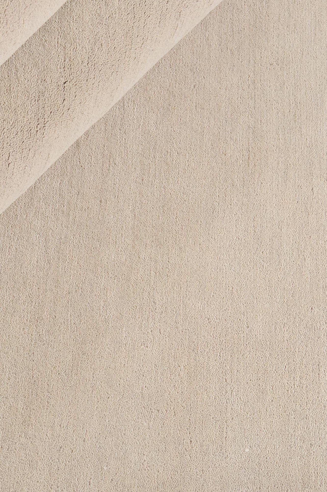 Luxury plain modern cream rug