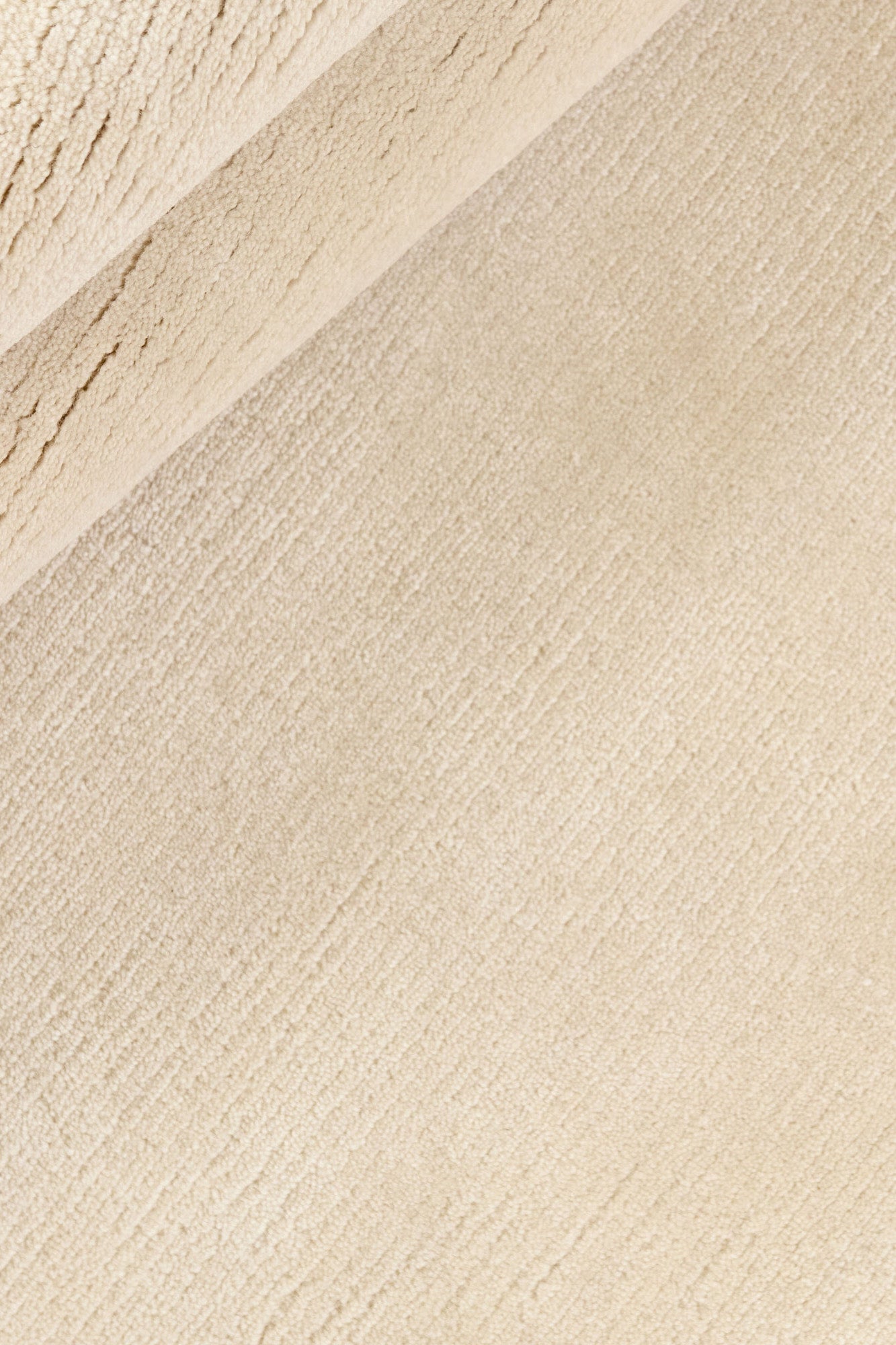 Luxury plain modern round cream rug