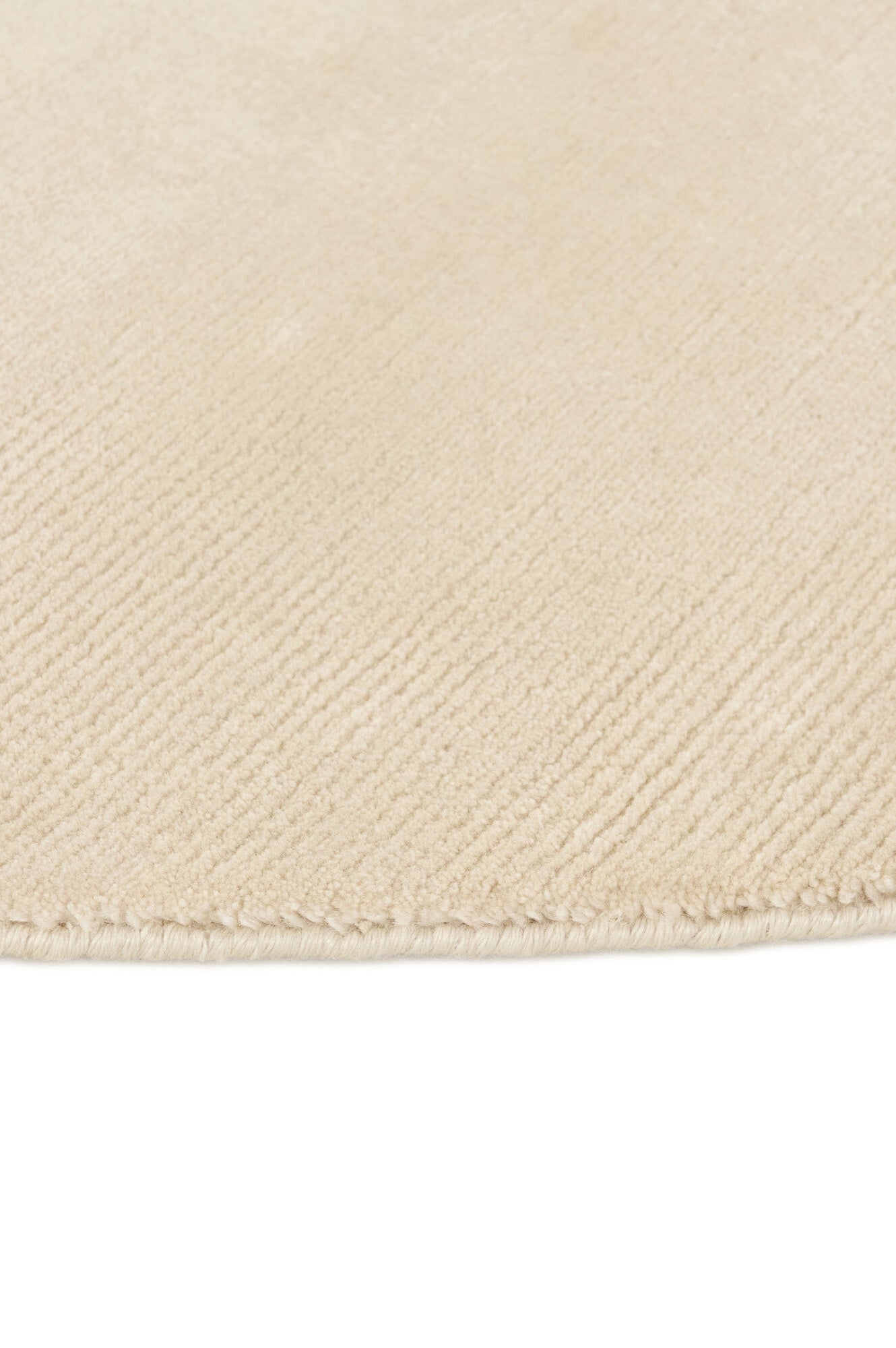 Luxury plain modern round cream rug