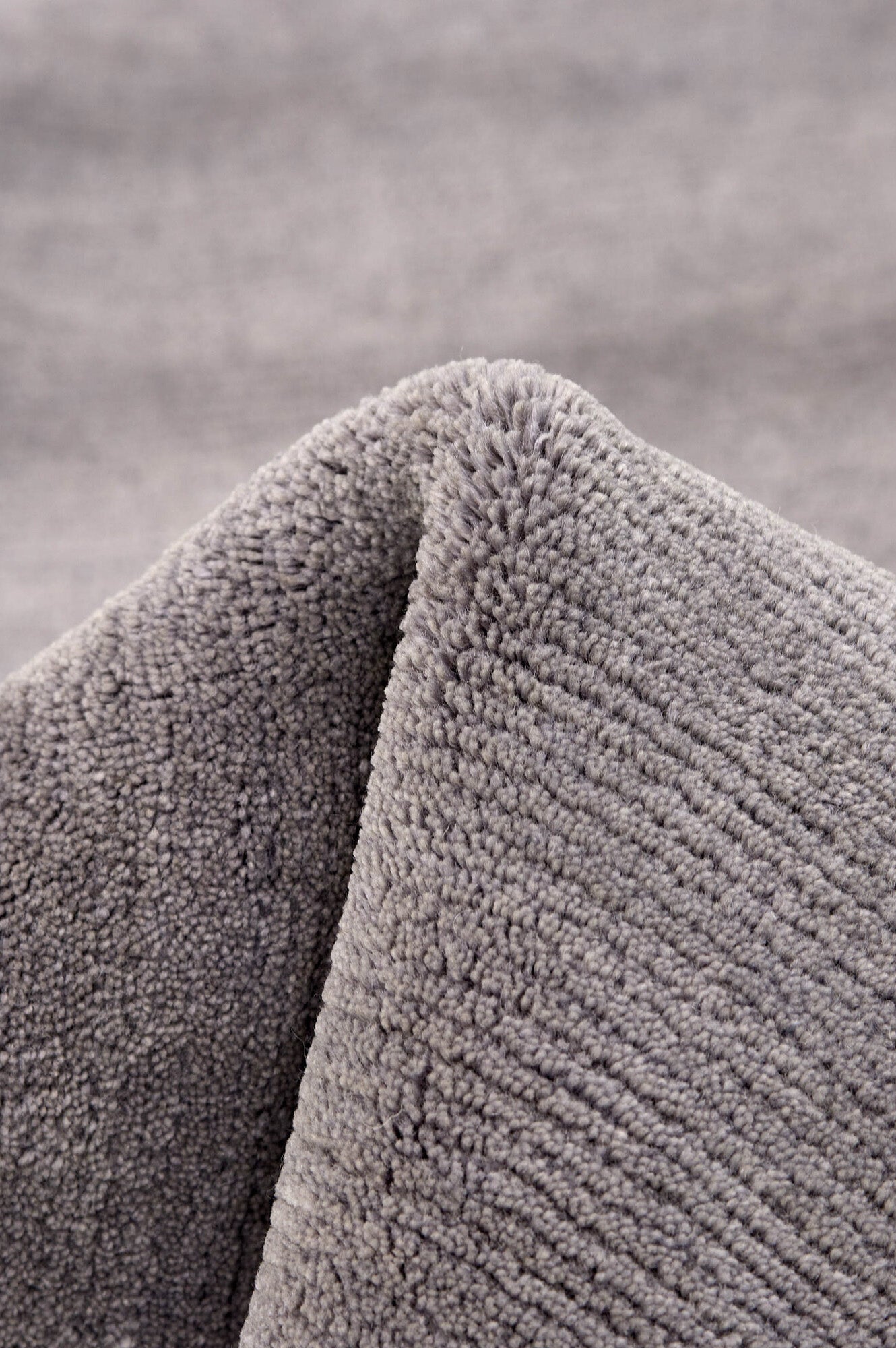 Luxury plain modern round grey rug