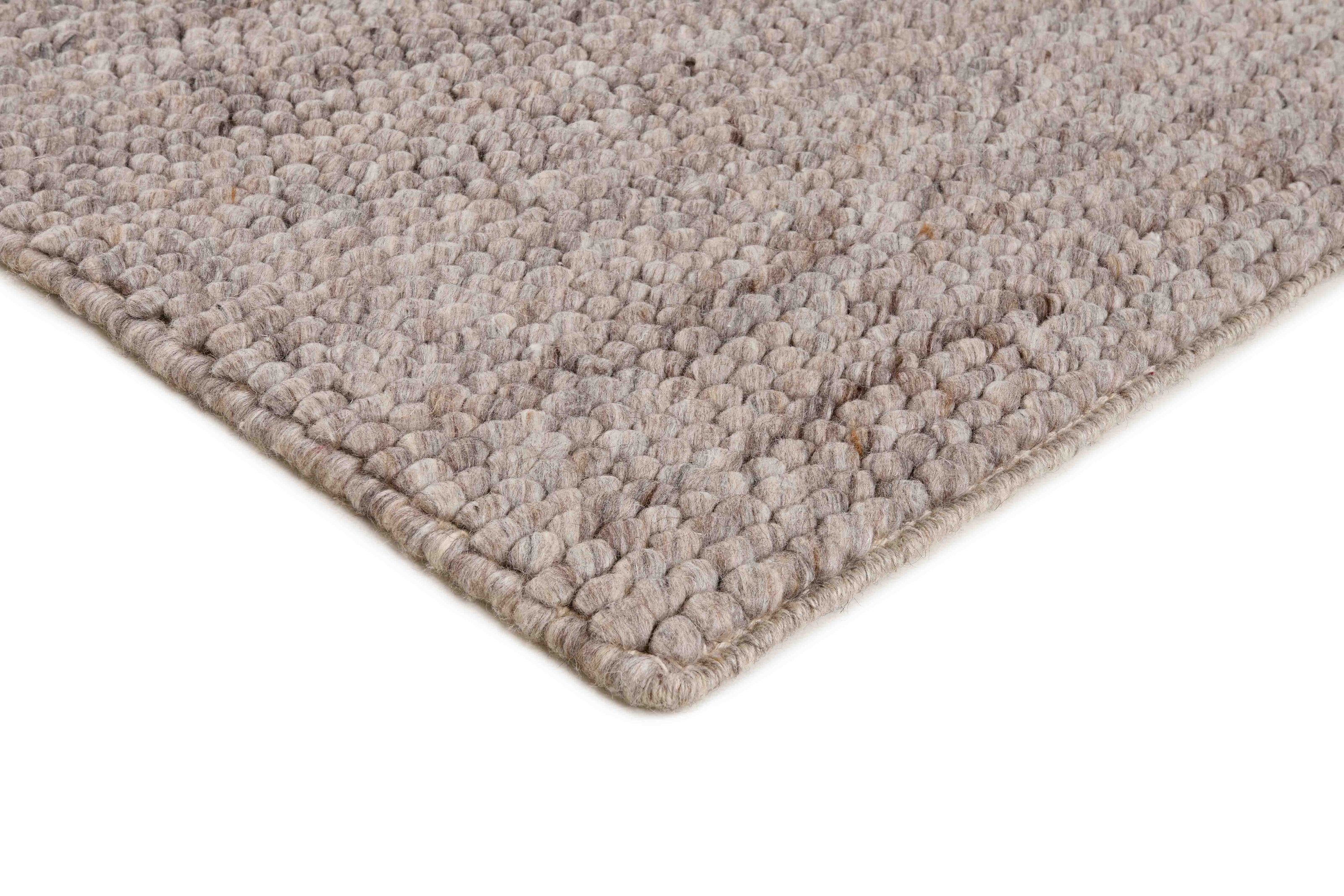 Beige textured wool rug