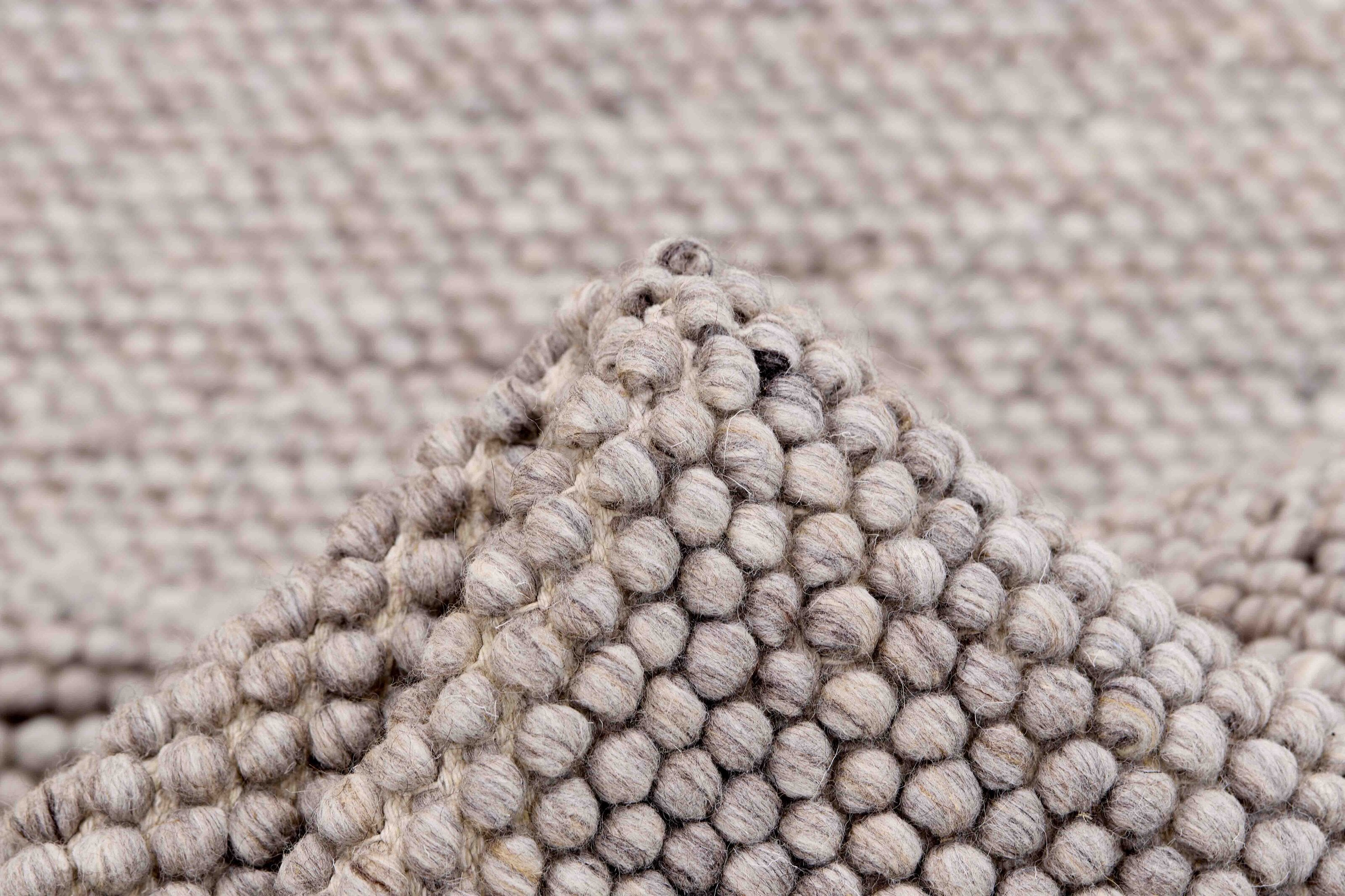 Beige textured wool rug
