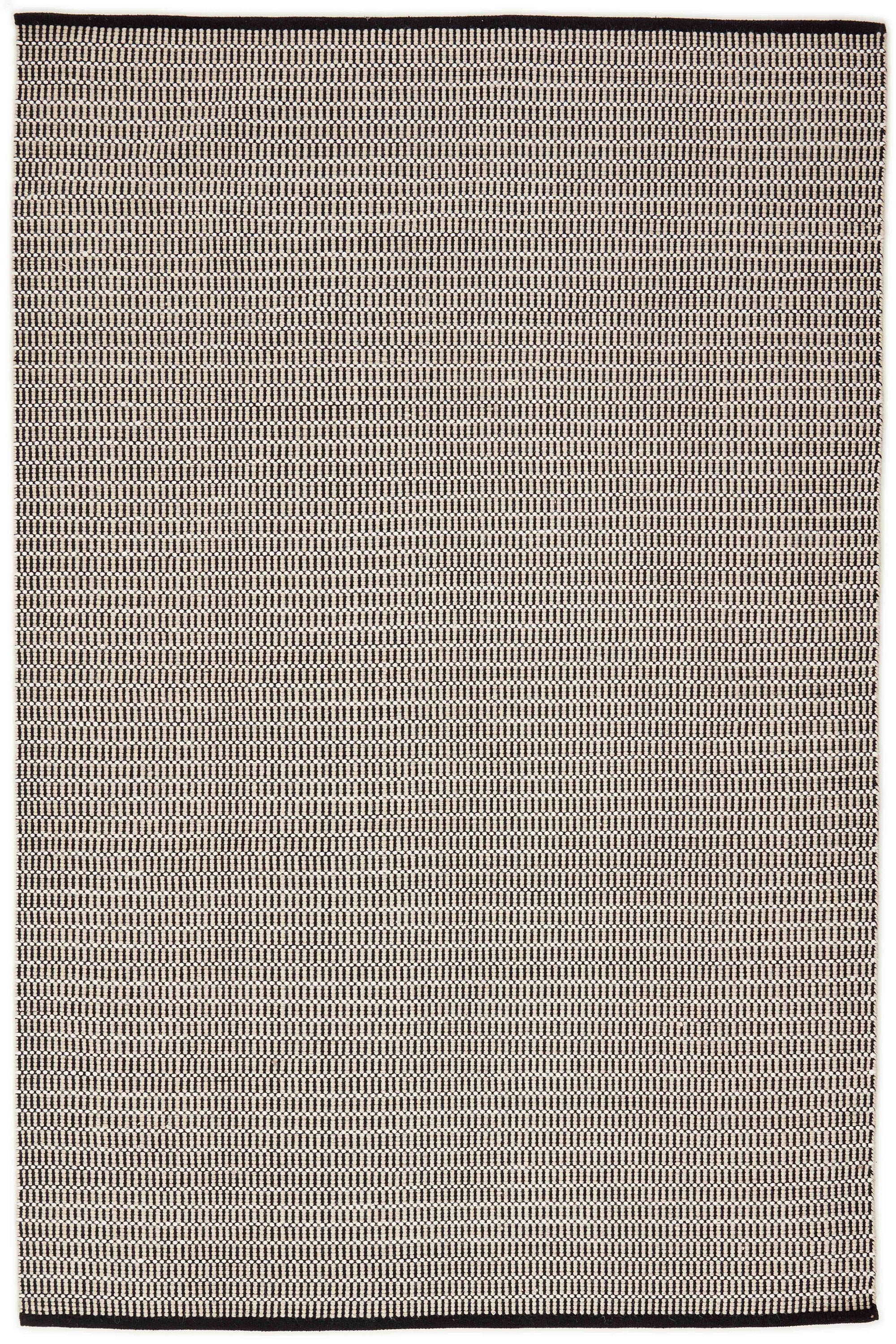 Luxury cream and black woven rug