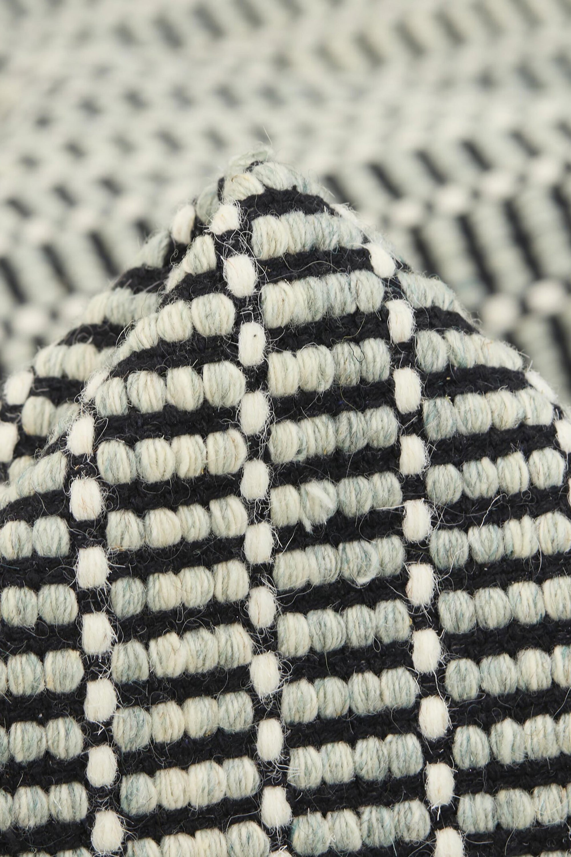 Luxury green and black woven rug