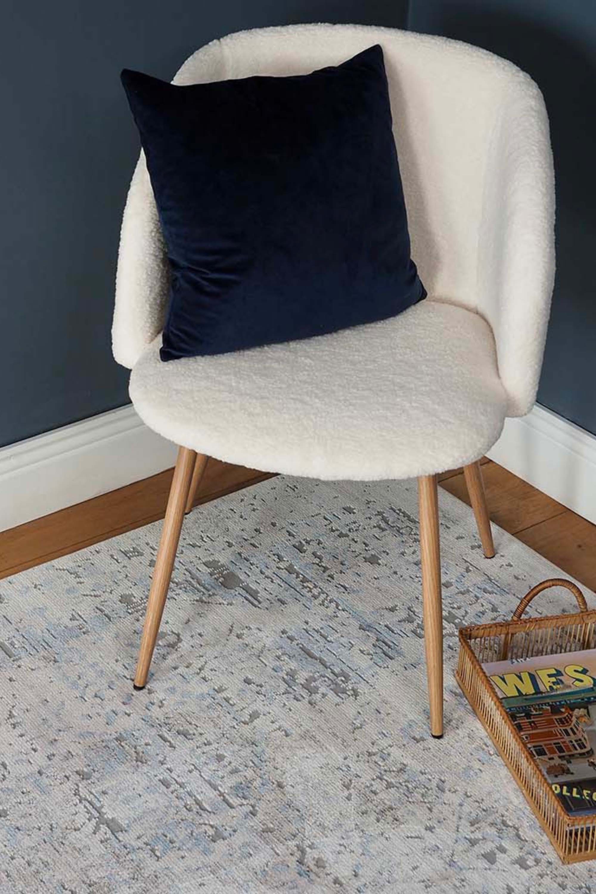 Persian style area rug in blue and grey