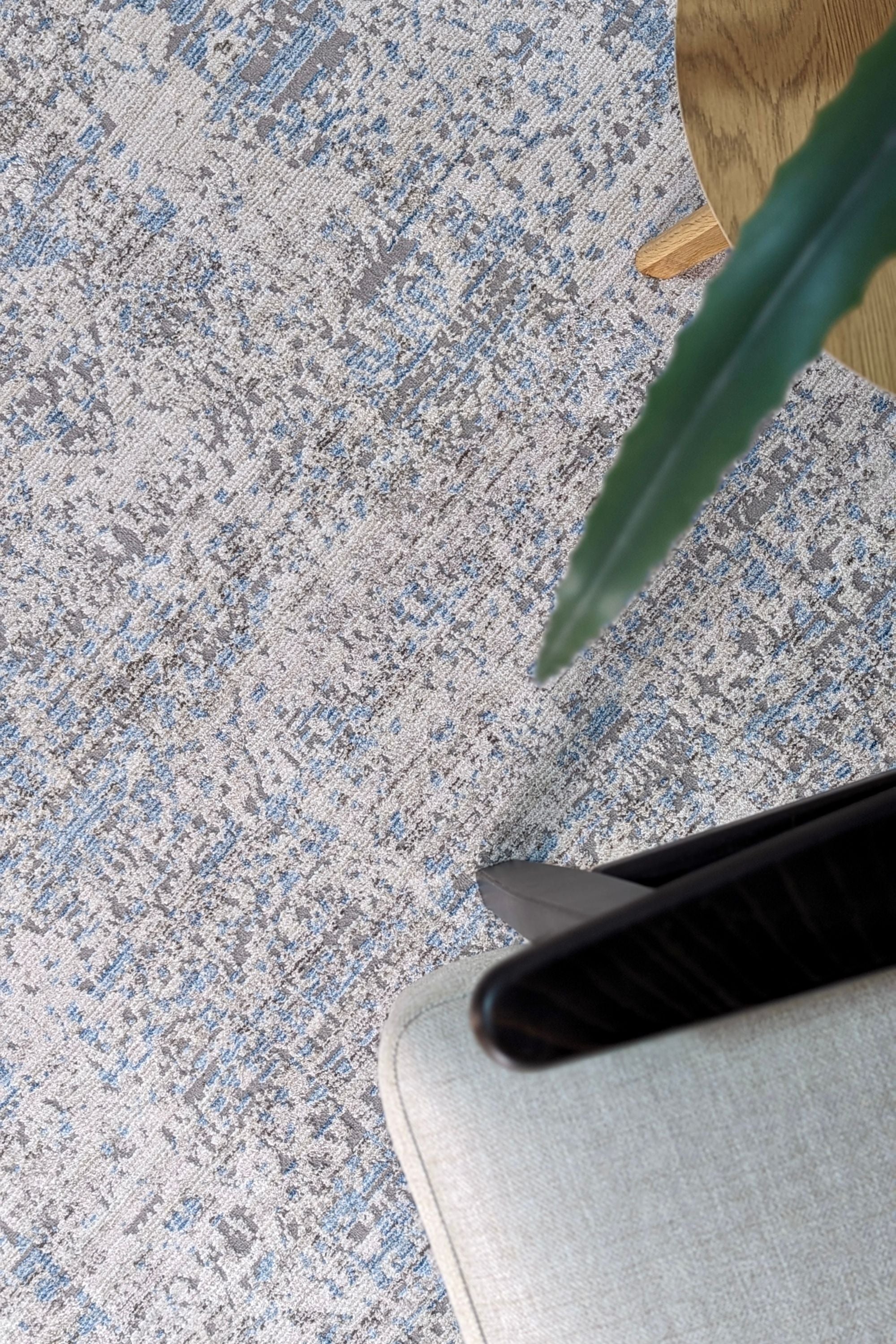 Persian style area rug in blue and grey