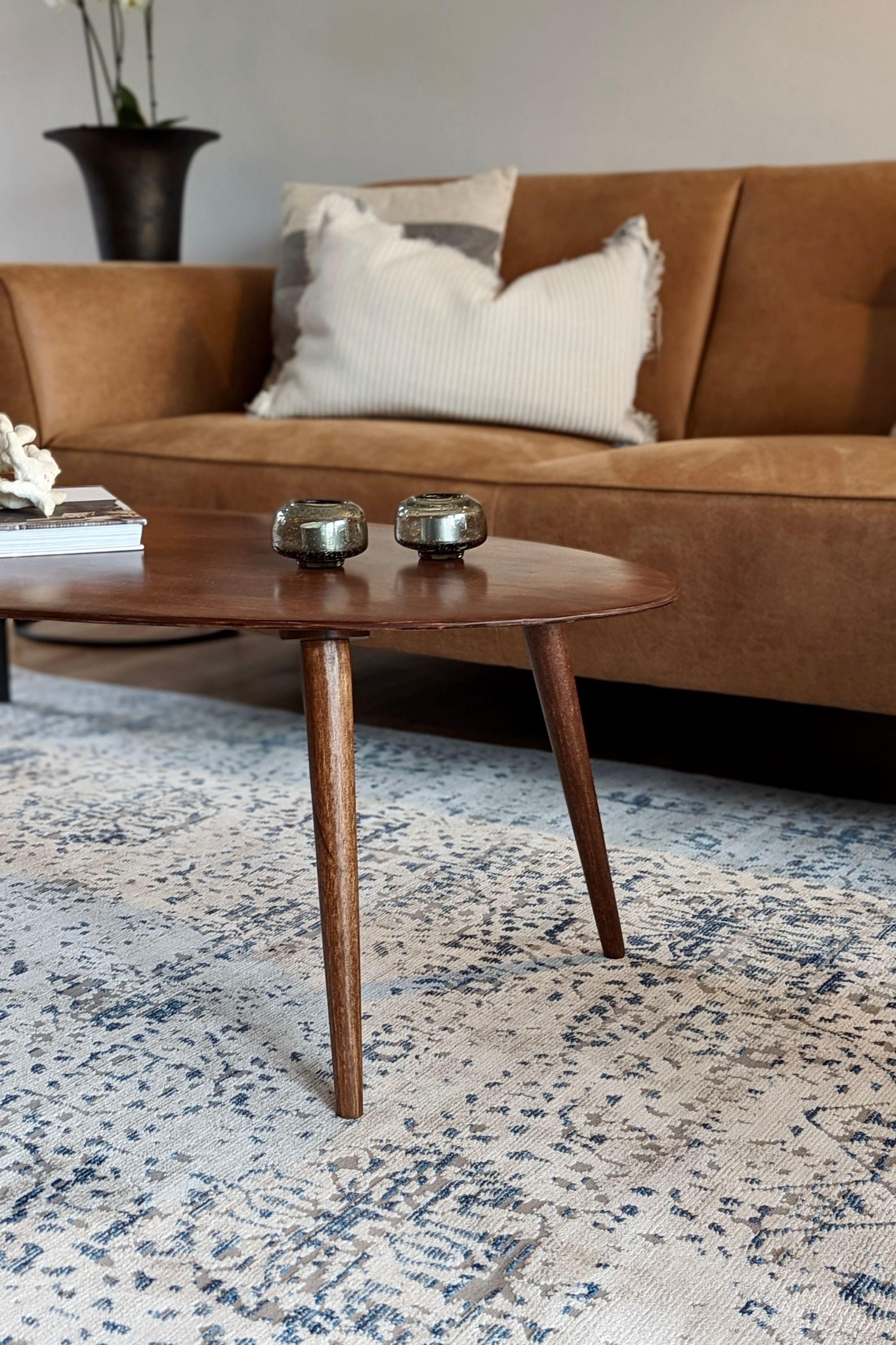 grey Persian style area rug with navy detail