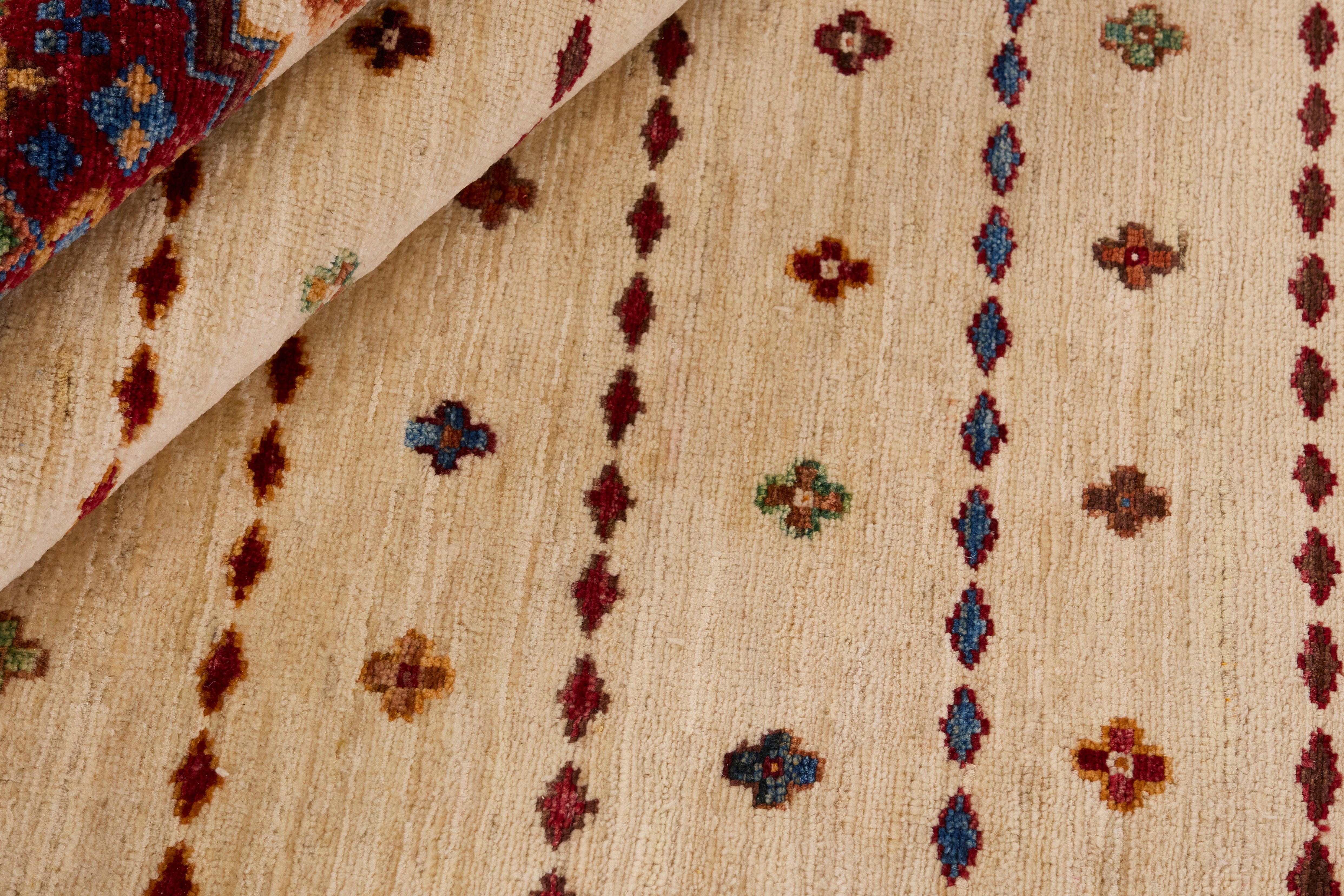 Authentic oriental Shall collection rug with traditional tile pattern in multicolour.