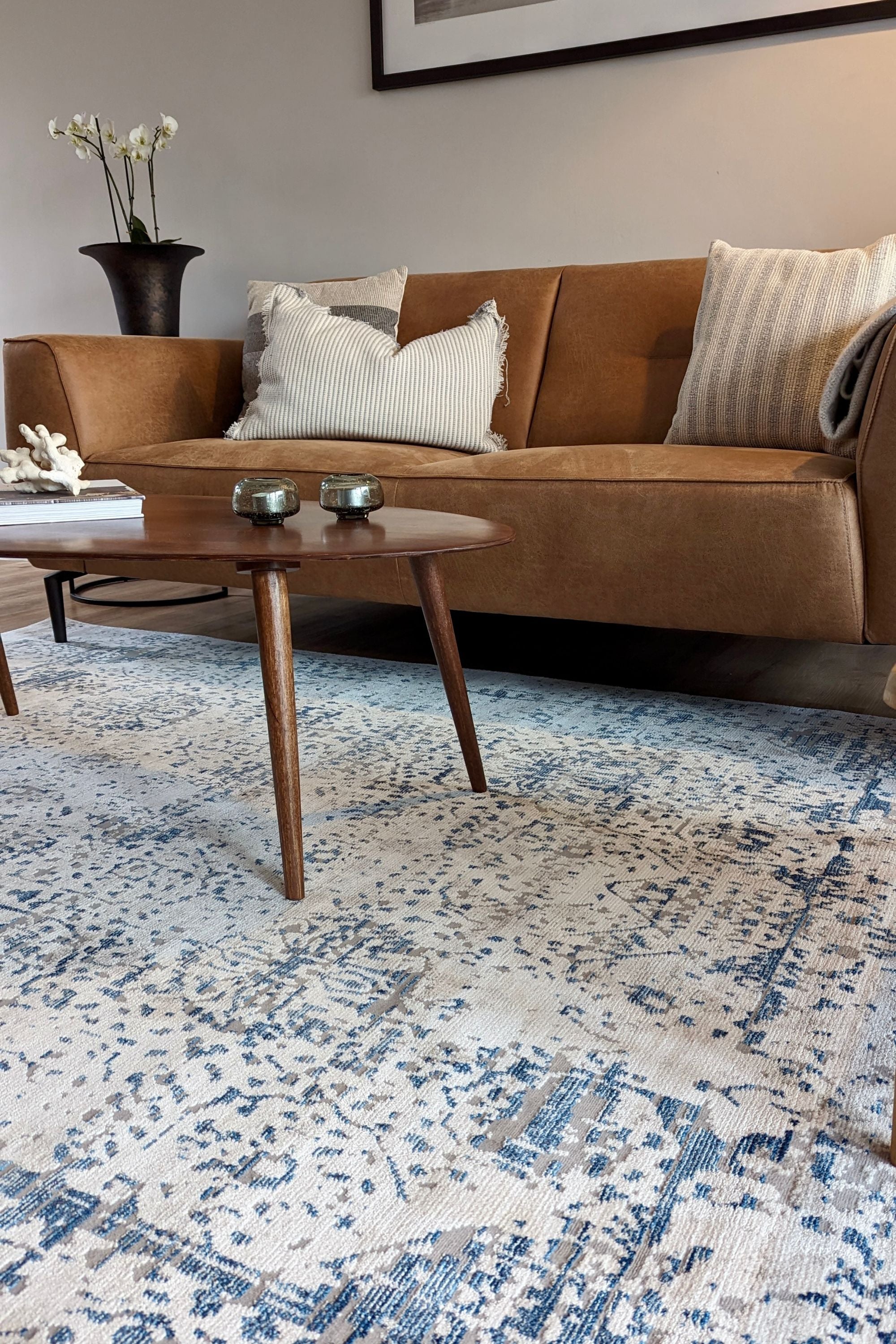 grey Persian style area rug with navy detail