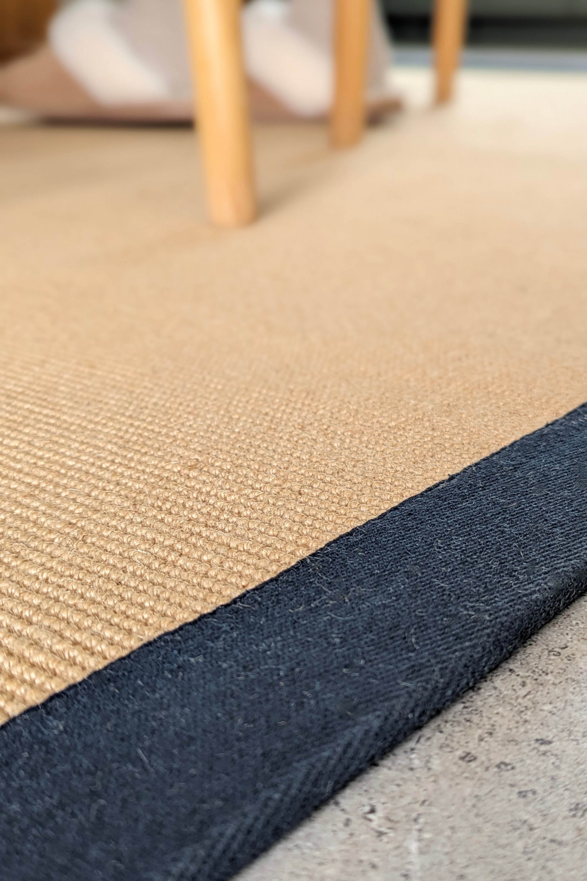 Sisal rug with navy linen border