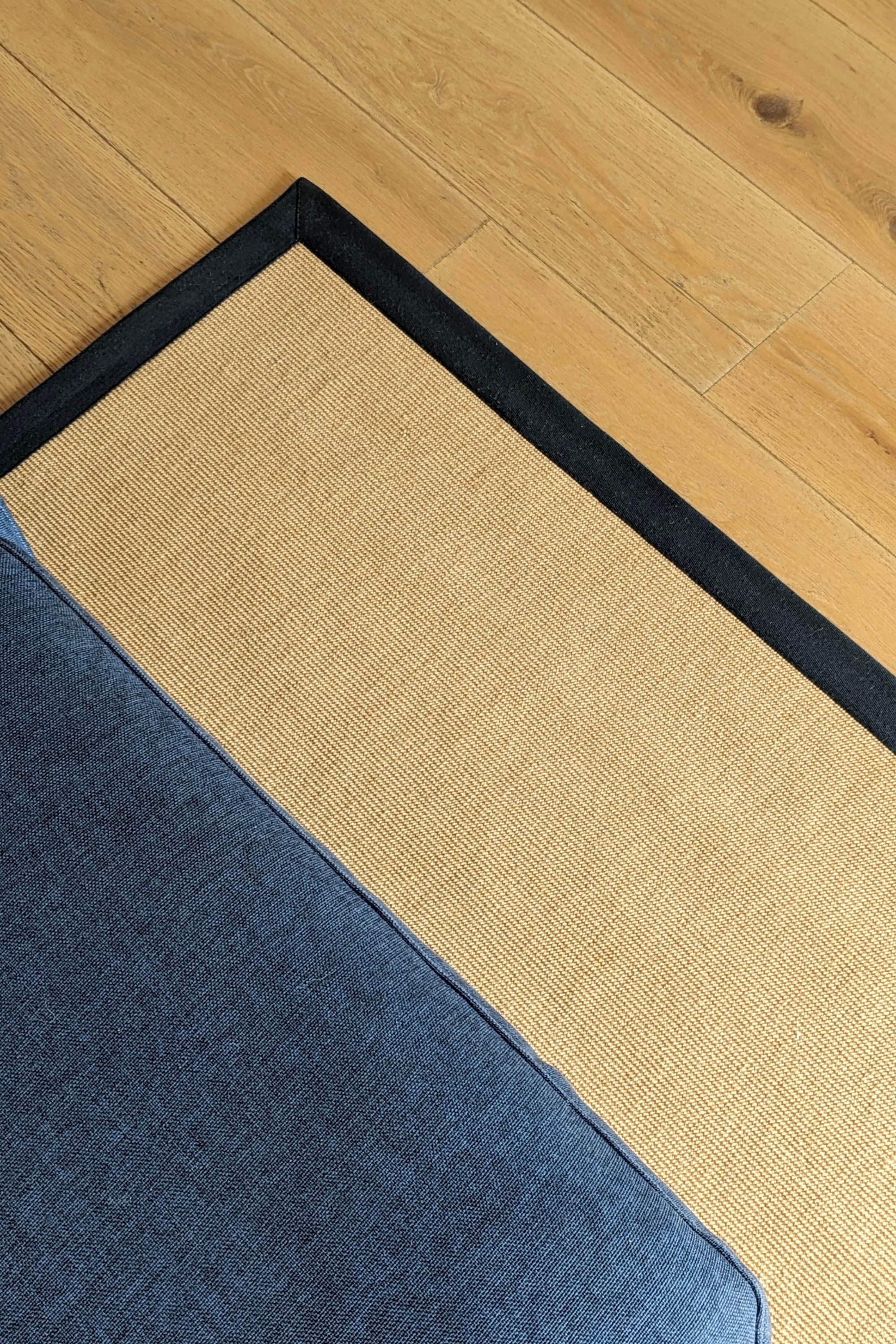 Sisal rug with navy linen border