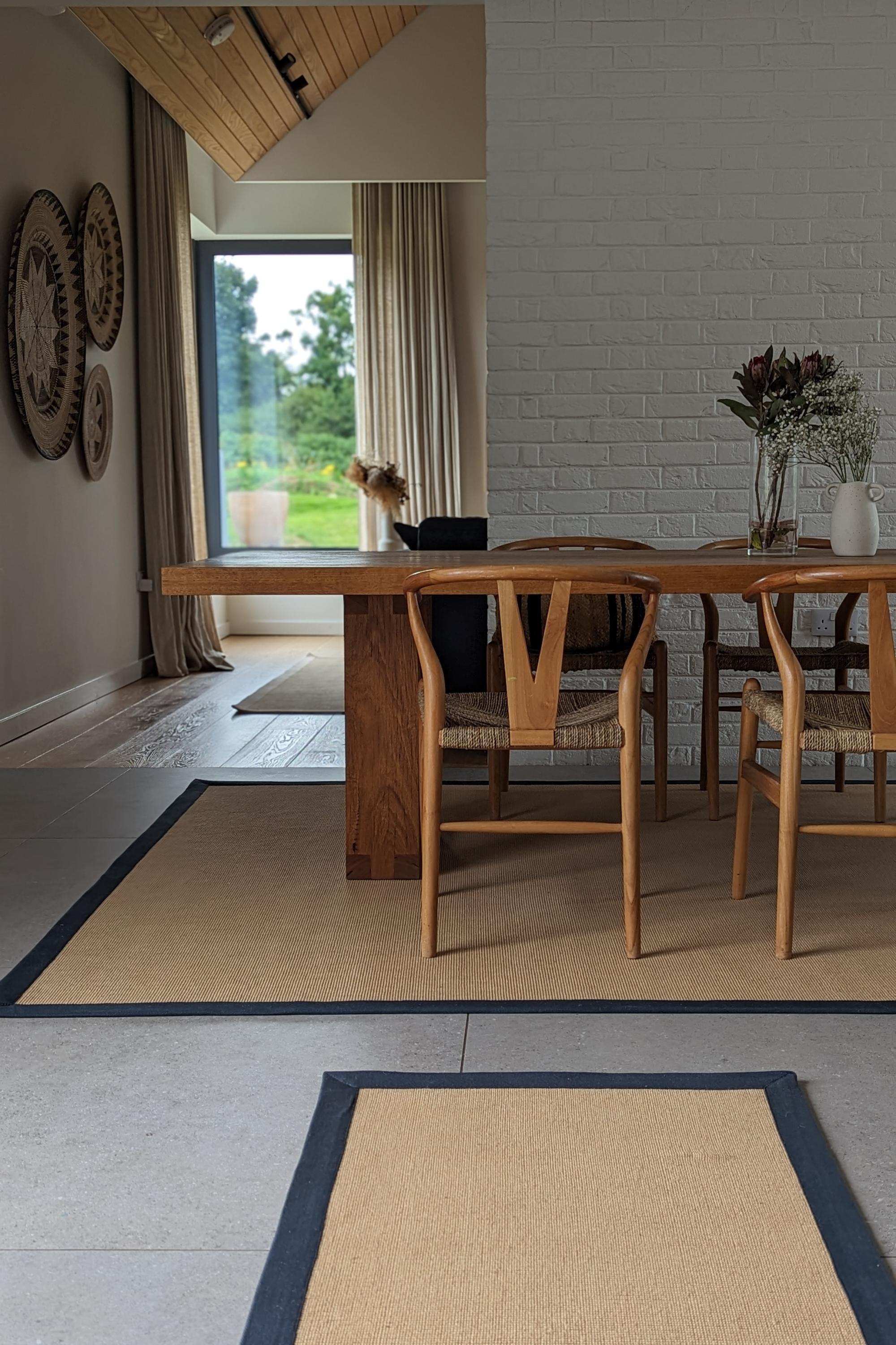 Sisal rug with navy linen border