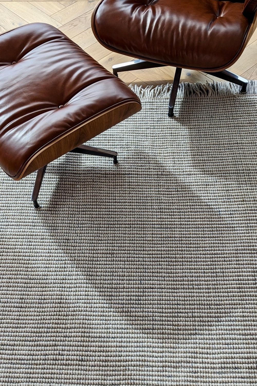 Grey and white textured flatweave rug
