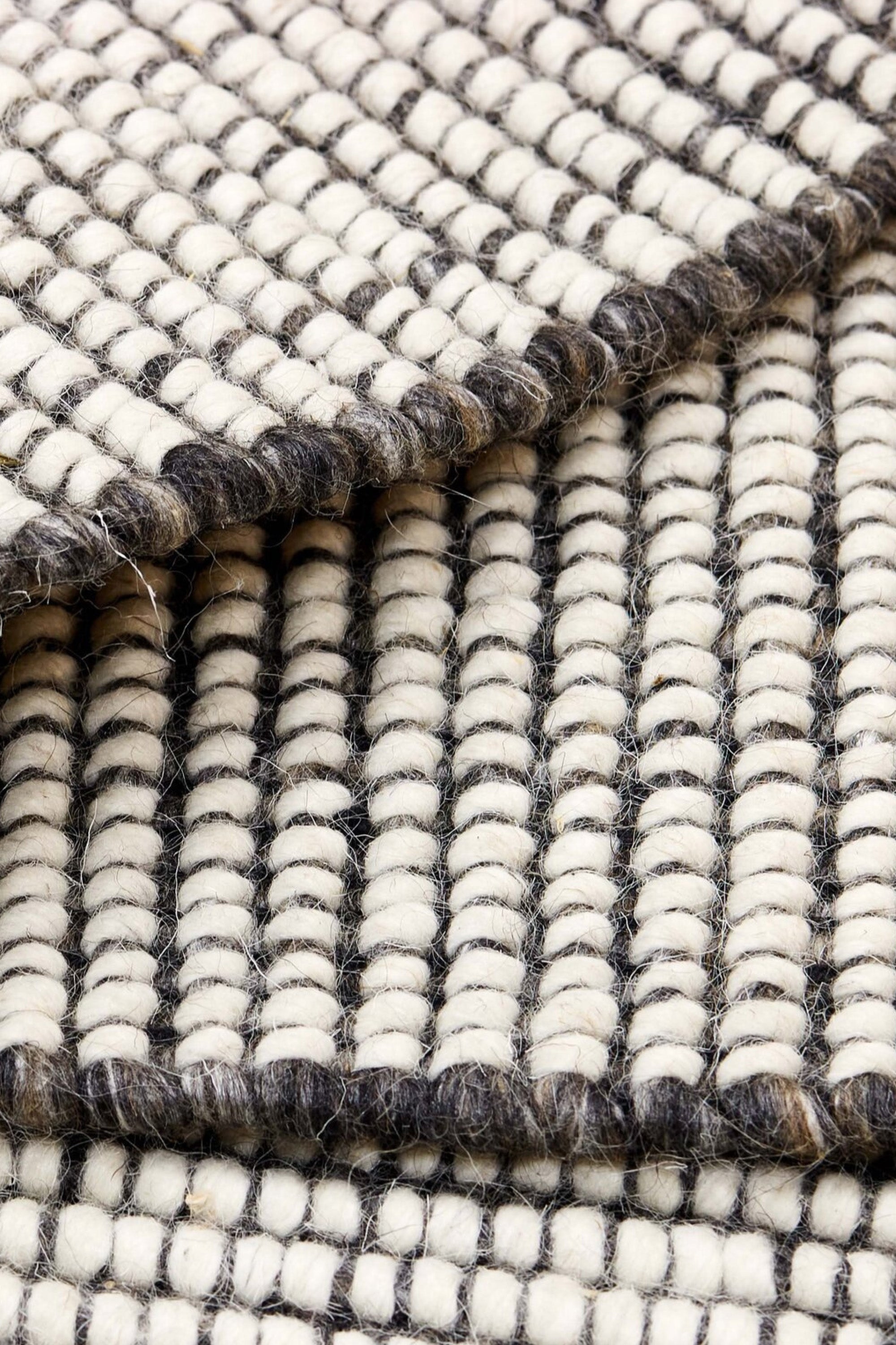 Dark grey and white textured flatweave runner